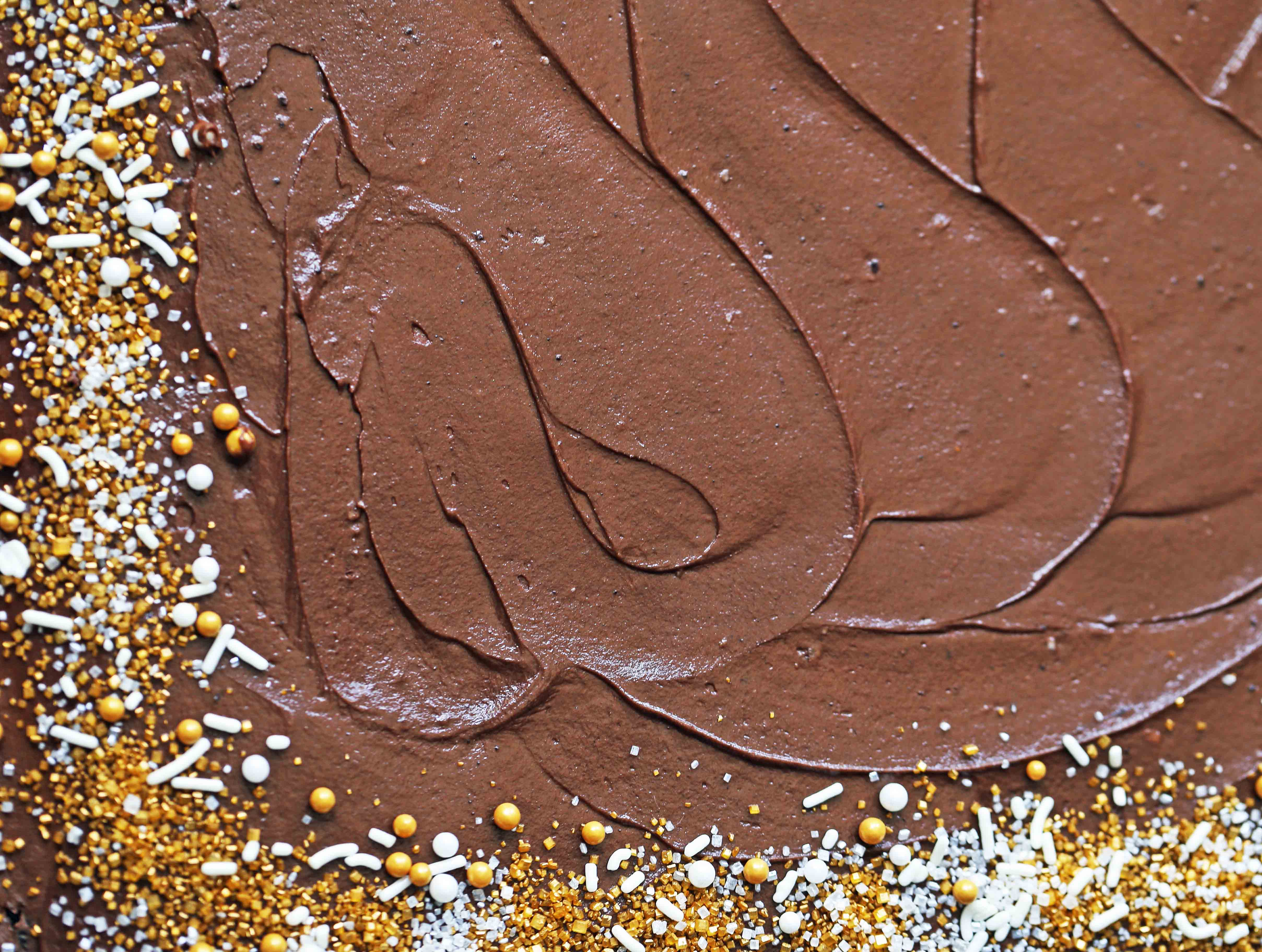 The Best Chocolate SHEET Cake with Milk Chocolate Frosting. Quick and easy homemade chocolate sheet cake recipe. www.modernhoney.com #chocolatesheetcake #sheetcake #chocolatesheetcakerecipe
