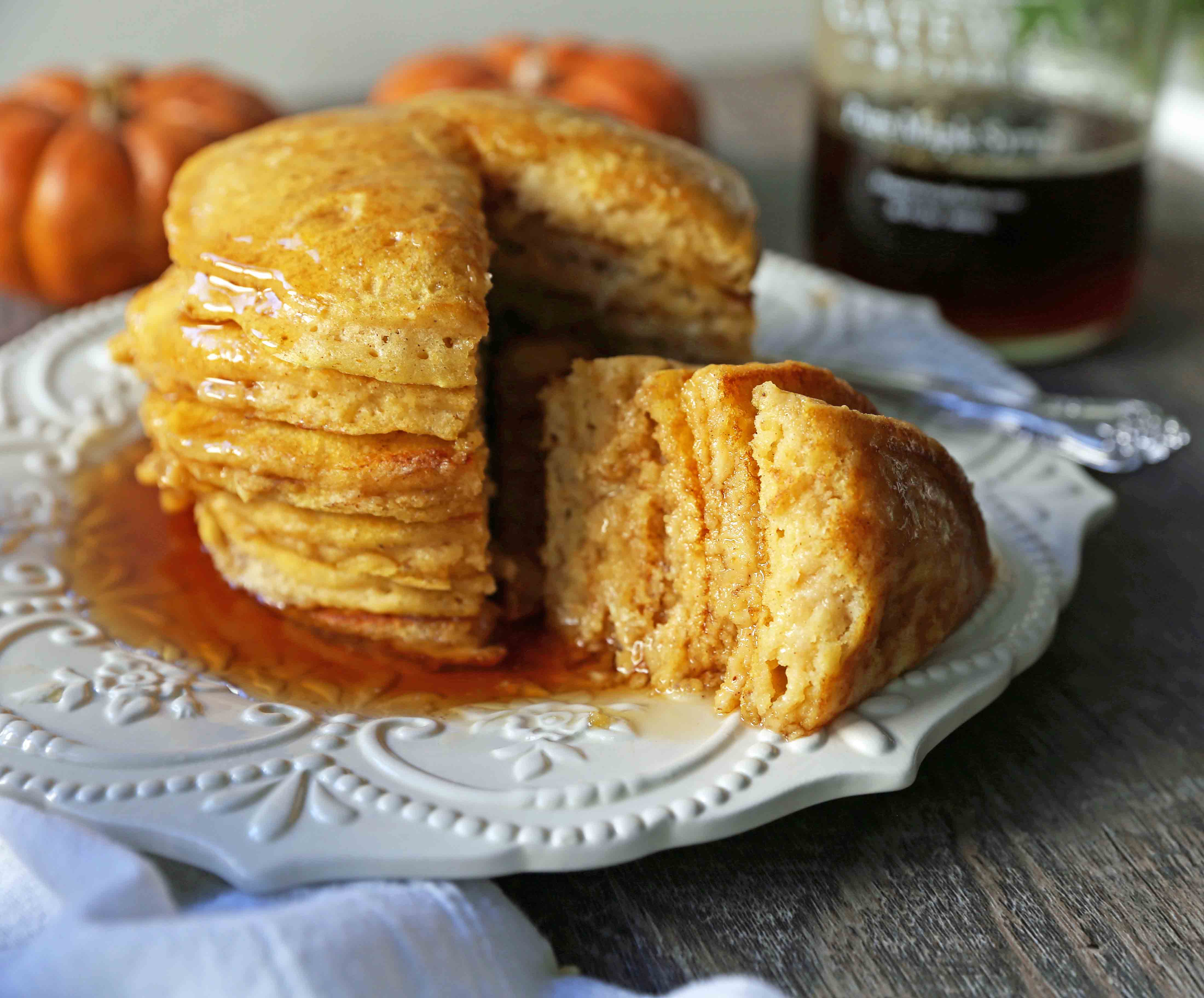 The BEST Pumpkin Pancakes. Light, fluffy, airy, and creamy pumpkin spiced pancakes. The perfect Fall breakfast. www.modernhoney.com #pumpkin #pumpkinpancakes #pumpkinrecipes #pumpkinbreakfast #fallbreakfast #pumpkinspice