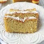 Almond Poppyseed Bread. Soft and moist poppyseed bread with vanilla bean almond glaze and candied almonds. The perfect poppyseed bread recipe.