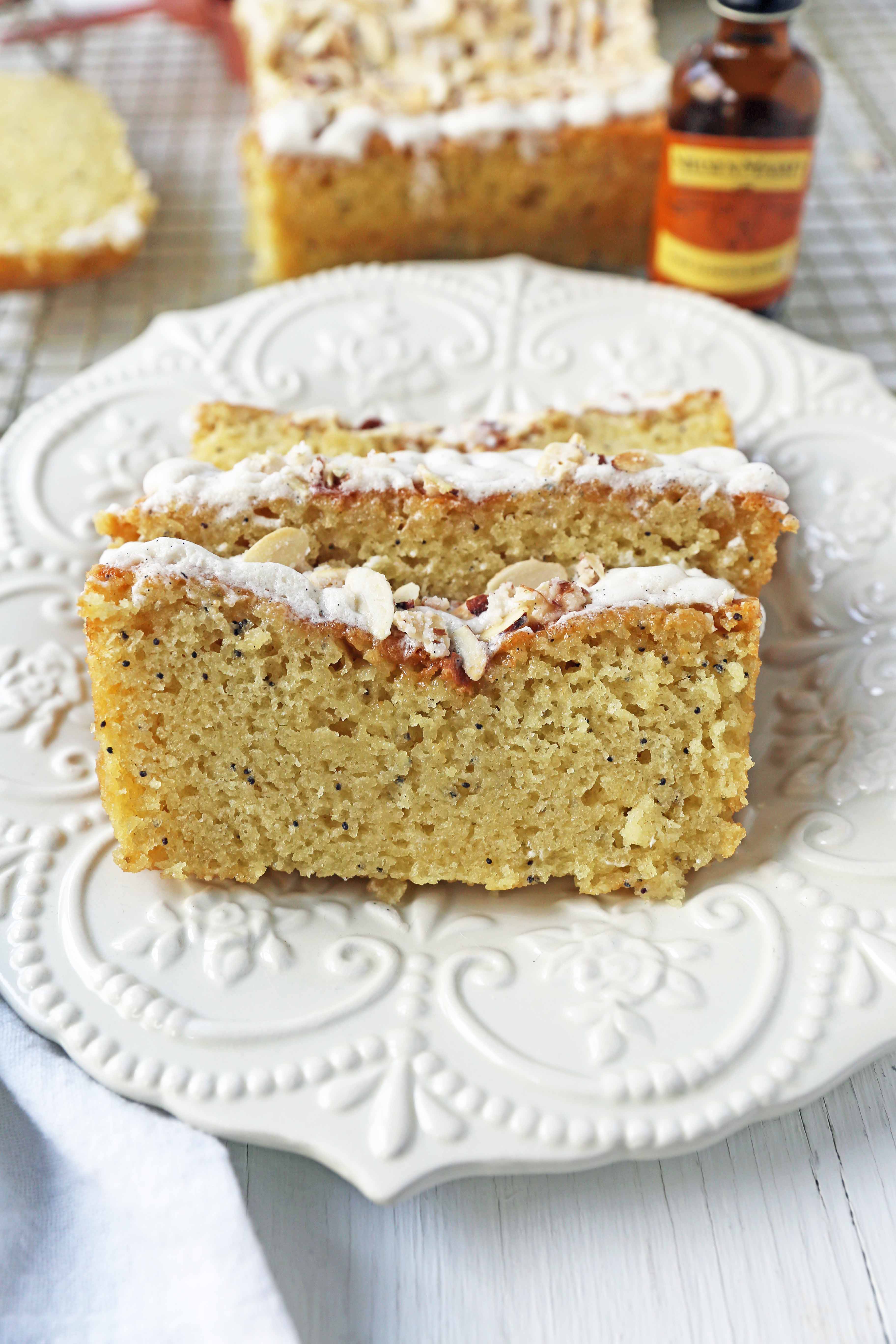 Almond Poppyseed Bread. Soft and moist poppyseed bread with vanilla bean almond glaze and candied almonds. The perfect poppyseed bread recipe. www.modernhoney.com #poppyseedbread #almondbread #quickbread 