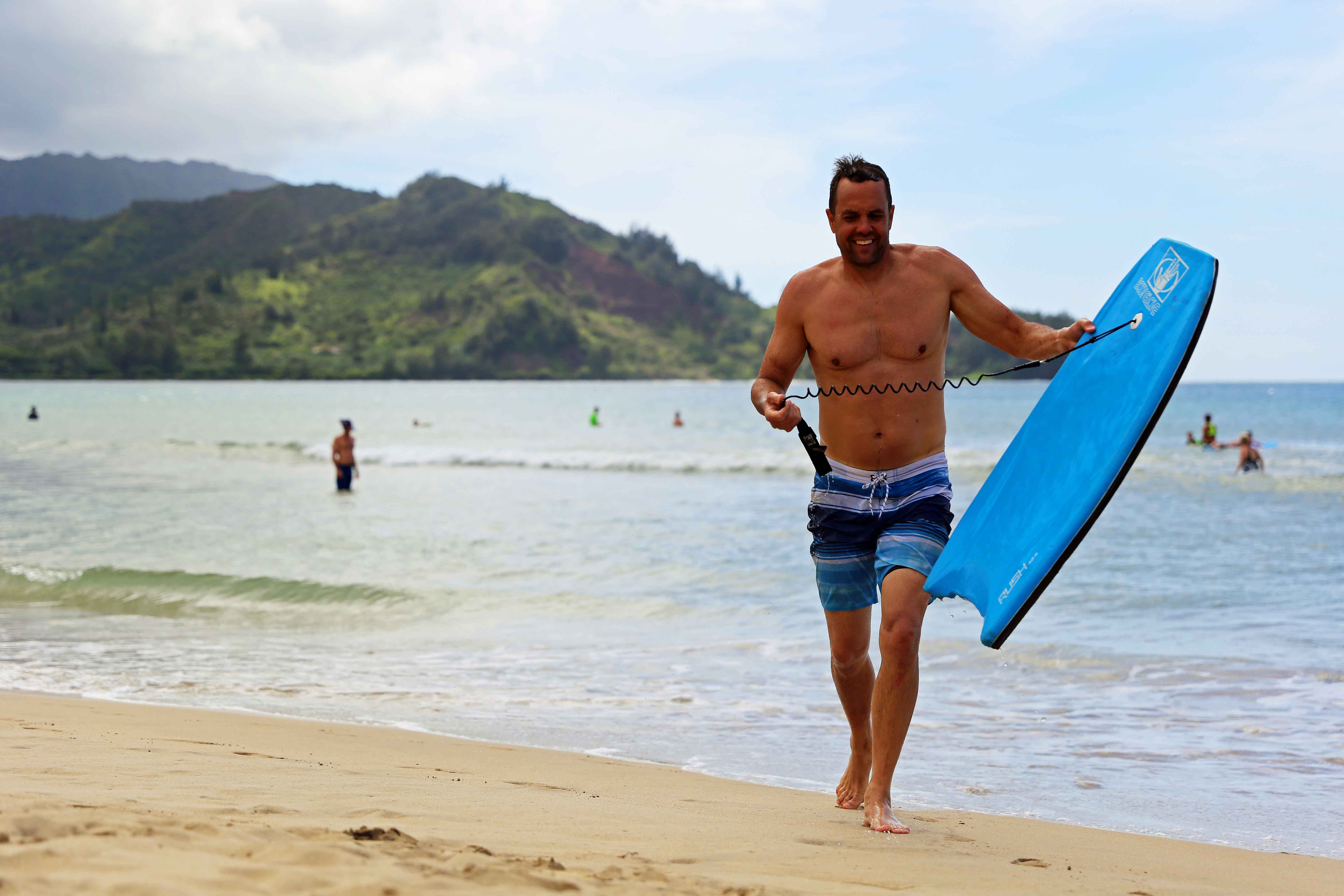 Kauai Hawaii Travel Guide. Boogie Boarding at Hanalei Bay