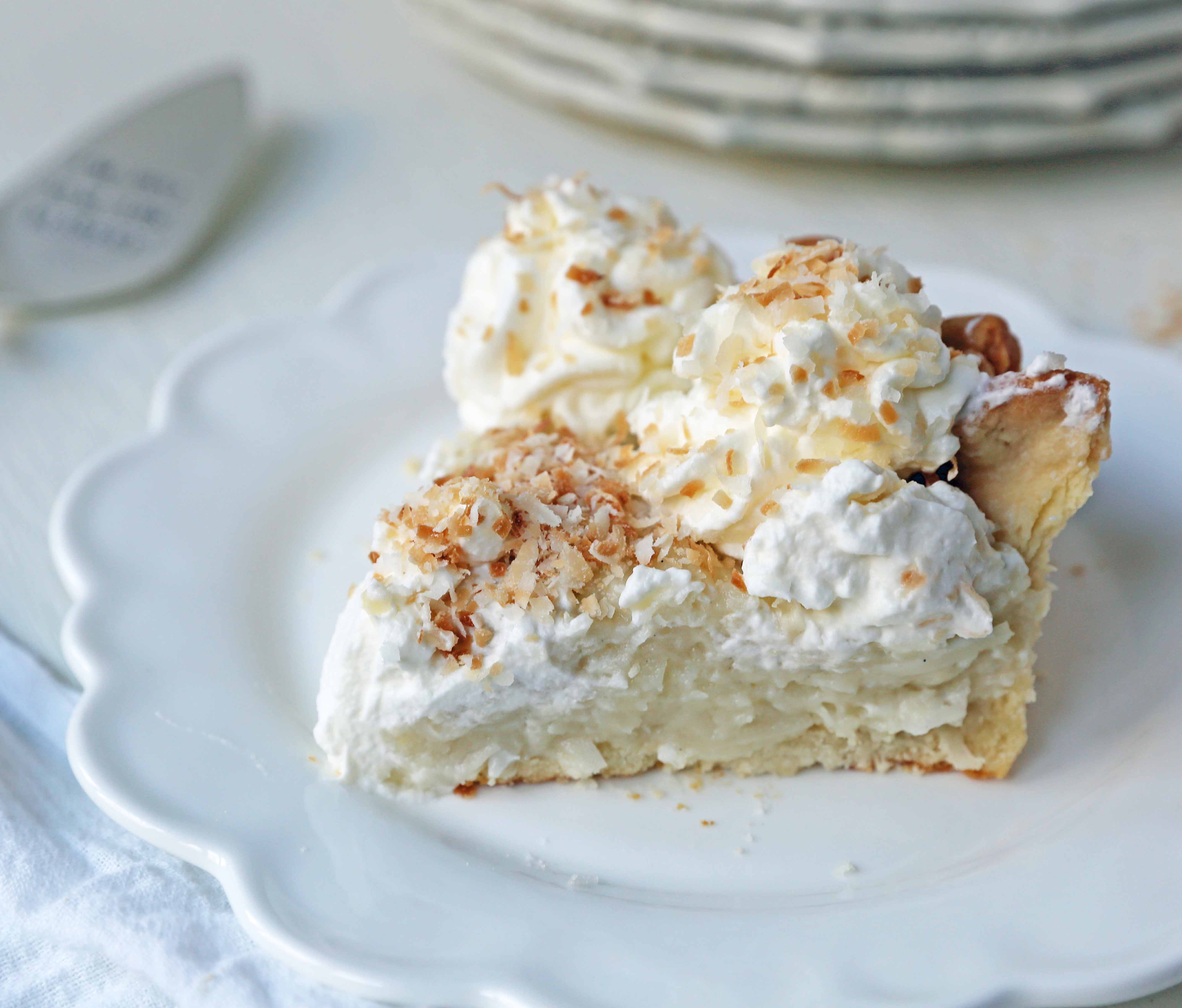 Coconut Cream Pie. A homemade coconut custard filling in a buttery pie crust topped with fresh whipped cream and toasted coconut. www.modernhoney.com #coconutcreampie #coconutpie #pie 