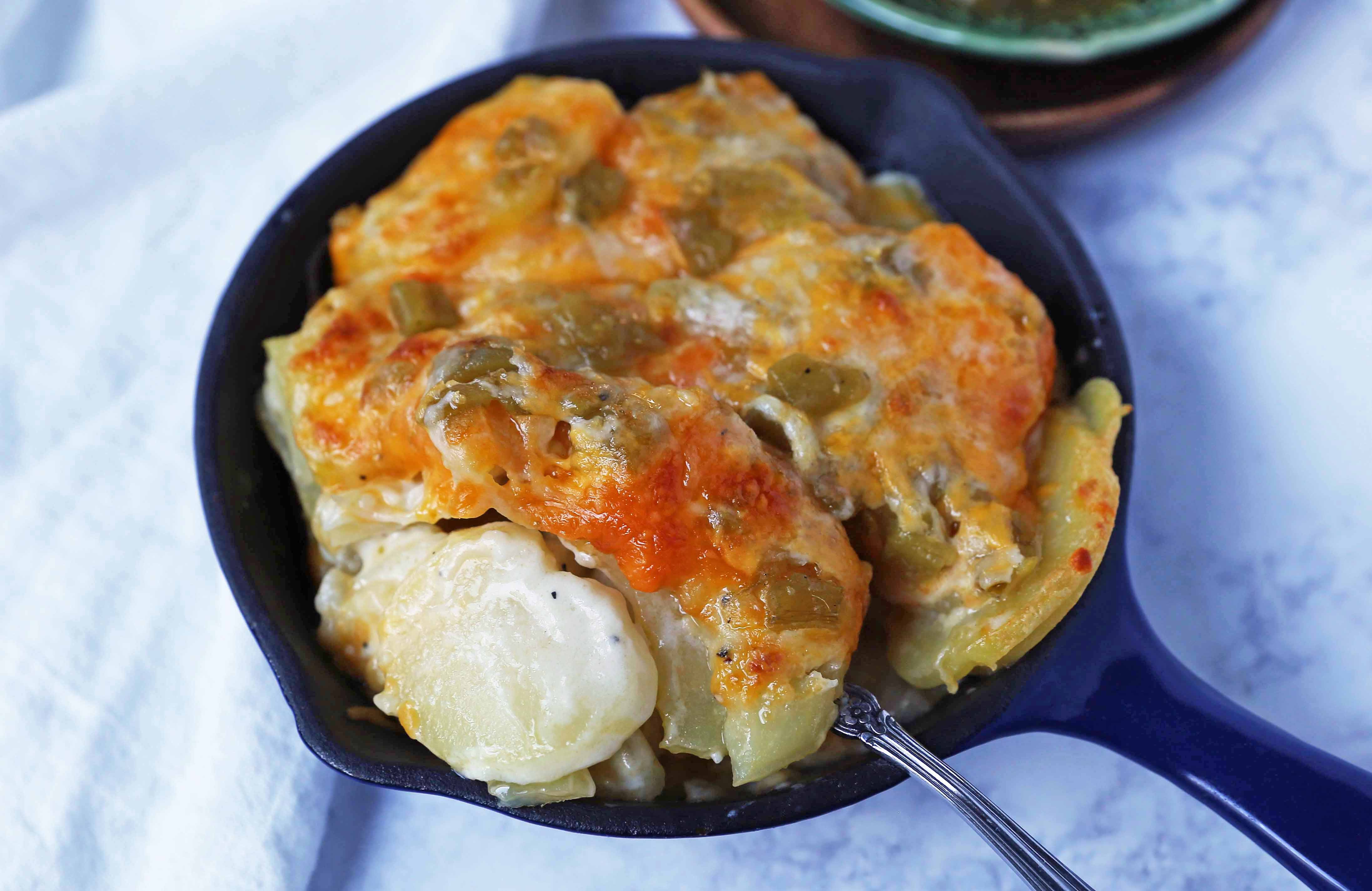 Cheesy Potatoes Au Gratin. Homemade cheesy scalloped potatoes with a rich cream sauce and melted cheddar cheese. The perfect potato side dish recipe! www.modernhoney.com #scallopedpotatoes #potatoesaugratin #potatoes #potato #thanksgiving