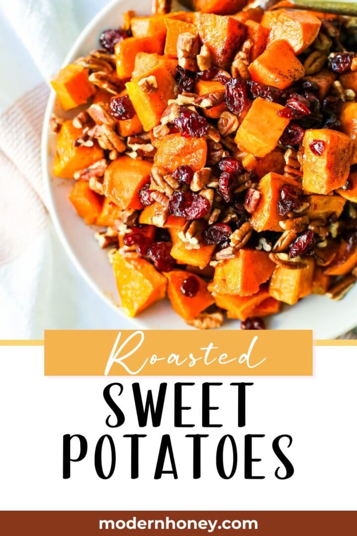 Roasted Sweet Potatoes with Cinnamon Maple Drizzle and tossed with dried cranberries and pecans. The perfect Fall side dish recipe! These roasted sweet potatoes make a beautiful Thanksgiving side dish. 