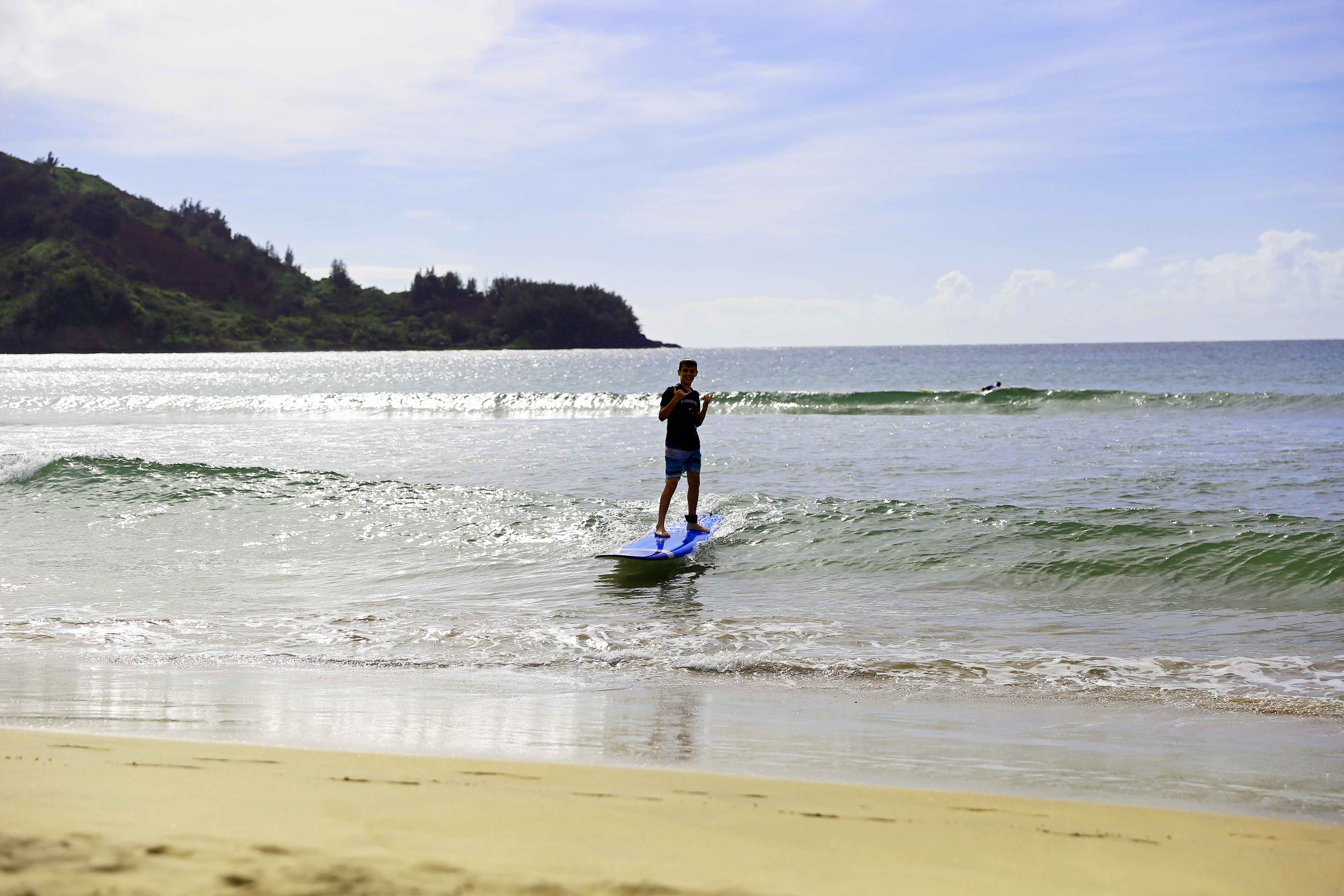 Surfing at Hanalei Bay