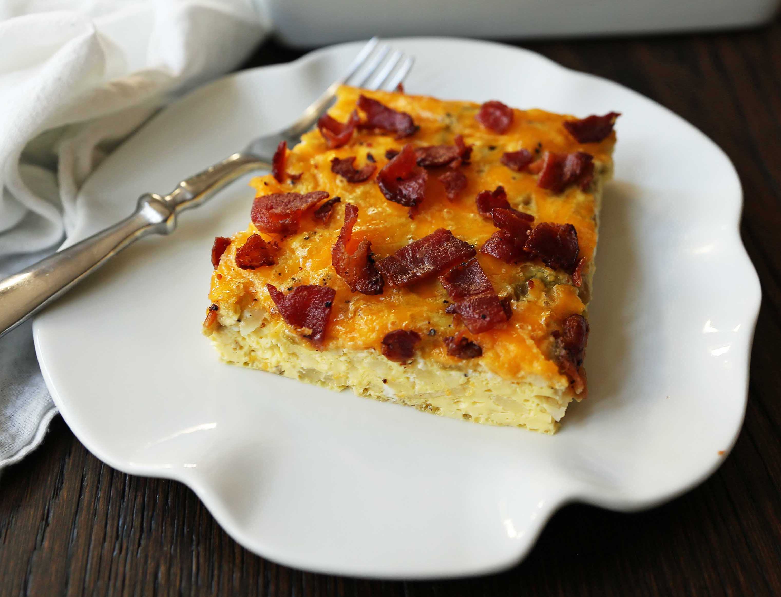 Bacon Egg and Cheese Casserole. An easy breakfast casserole recipe. Green Chili Bacon Cheese Egg Breakfast Souffle. www.modernhoney.com #breakfast #eggs #eggdish #eggcasserole #breakfastcasserole #christmas #christmasbreakfast #christmascasserole