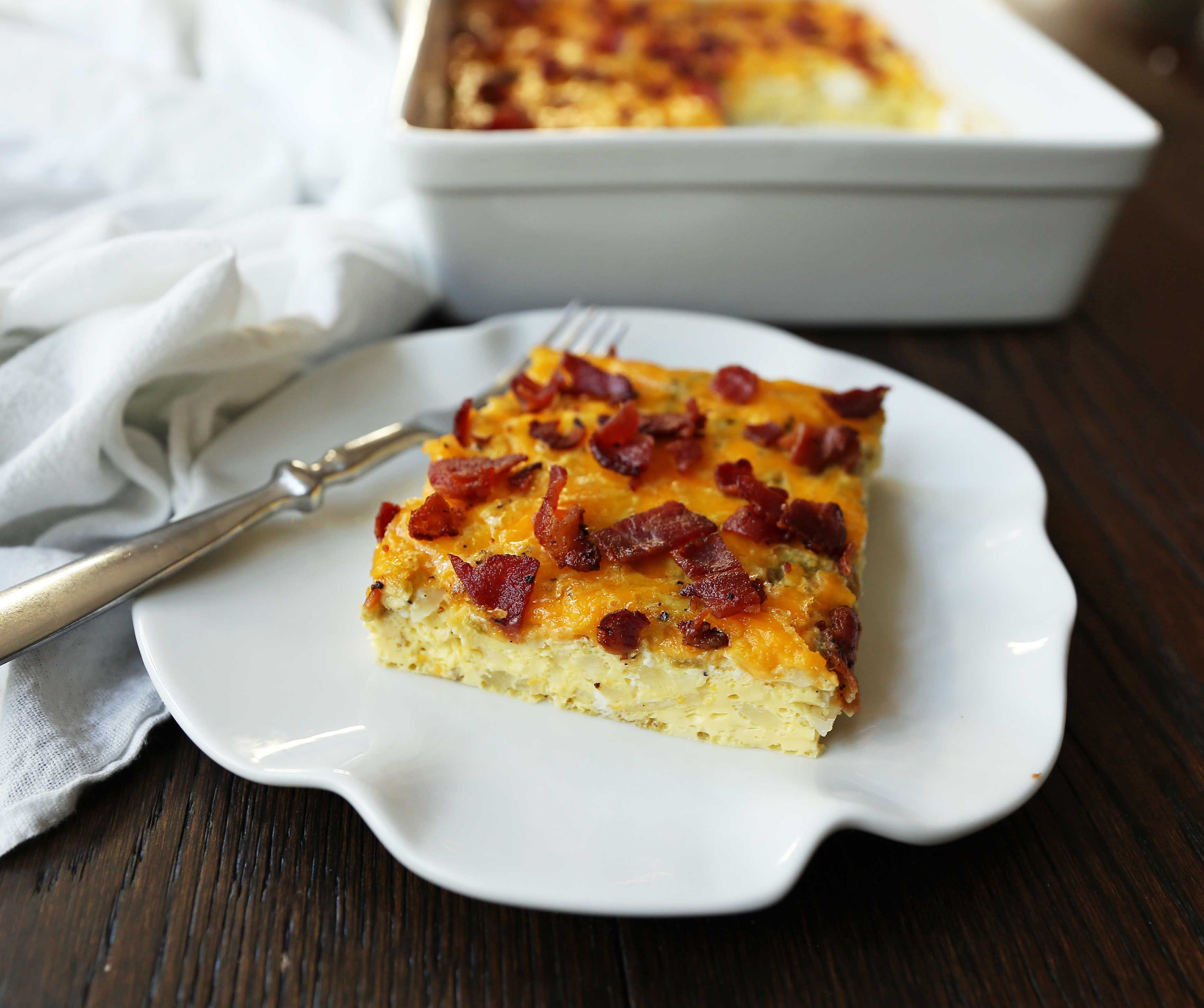 Bacon Egg and Cheese Casserole. An easy breakfast casserole recipe. Green Chili Bacon Cheese Egg Breakfast Souffle. www.modernhoney.com #breakfast #eggs #eggdish #eggcasserole #breakfastcasserole #christmas #christmasbreakfast #christmascasserole