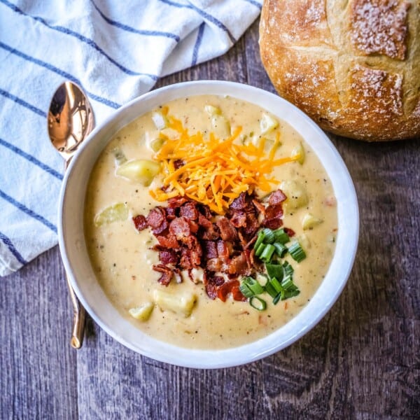 The Best Baked Potato Soup Recipe. This Potato Cheese Soup is the perfect potato soup topped with crispy bacon, cheddar cheese, and green onions.