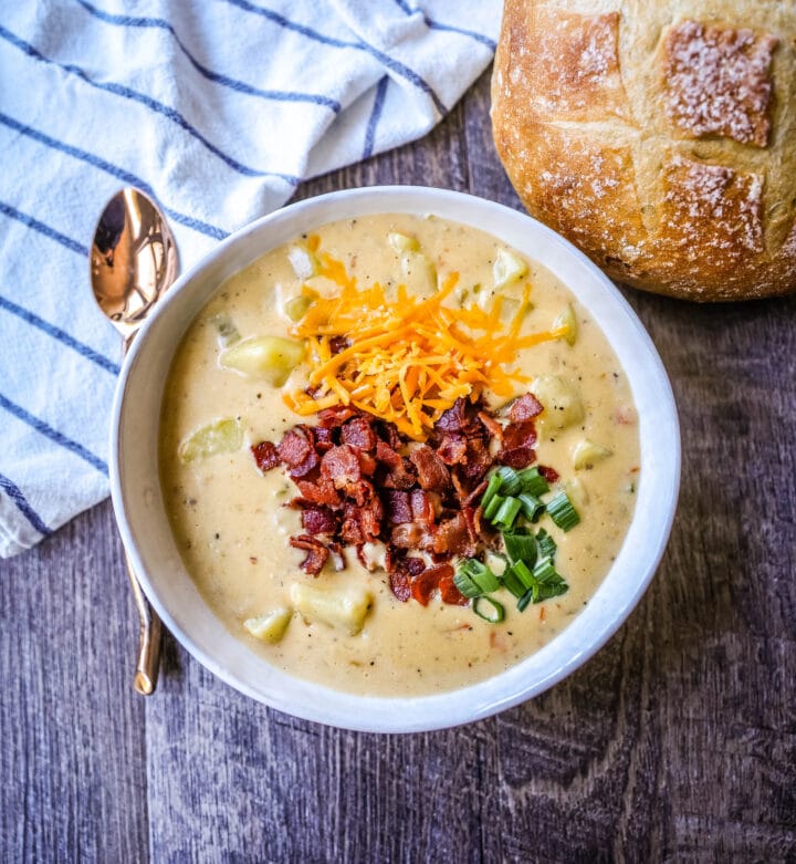 The Best Baked Potato Soup Recipe. This Potato Cheese Soup is the perfect potato soup topped with crispy bacon, cheddar cheese, and green onions.