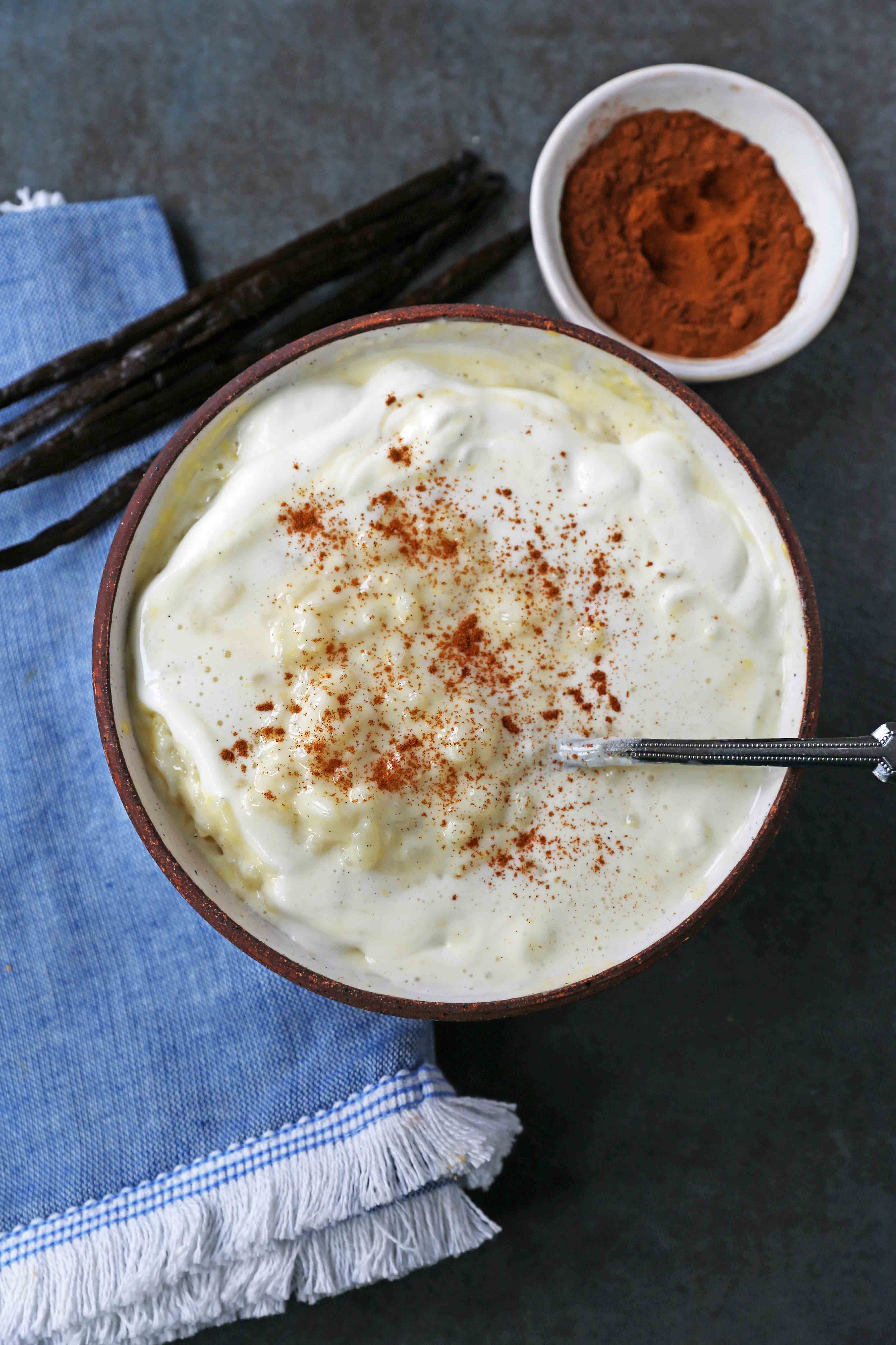 Creamy Homemade Rice Pudding. Rich and Creamy Rice Pudding with Creme Anglaise and Fresh Whipped Cream. www.modernhoney.com #ricepudding #ricepuddingrecipe #christmasrecipes #christmasrecipes