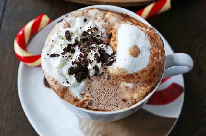 Homemade Hot Chocolate Recipe. How to make easy 5-ingredient gourmet hot chocolate. This Slow Cooker Hot Chocolate is perfect to serve at parties. A list of hot chocolate toppings ideas to make your very own Hot Chocolate Bar. www.modernhoney.com #hotchocolate #homemadehotchocolate #chocolate #hotchocolatebar #hotchocolatetoppings #christmas