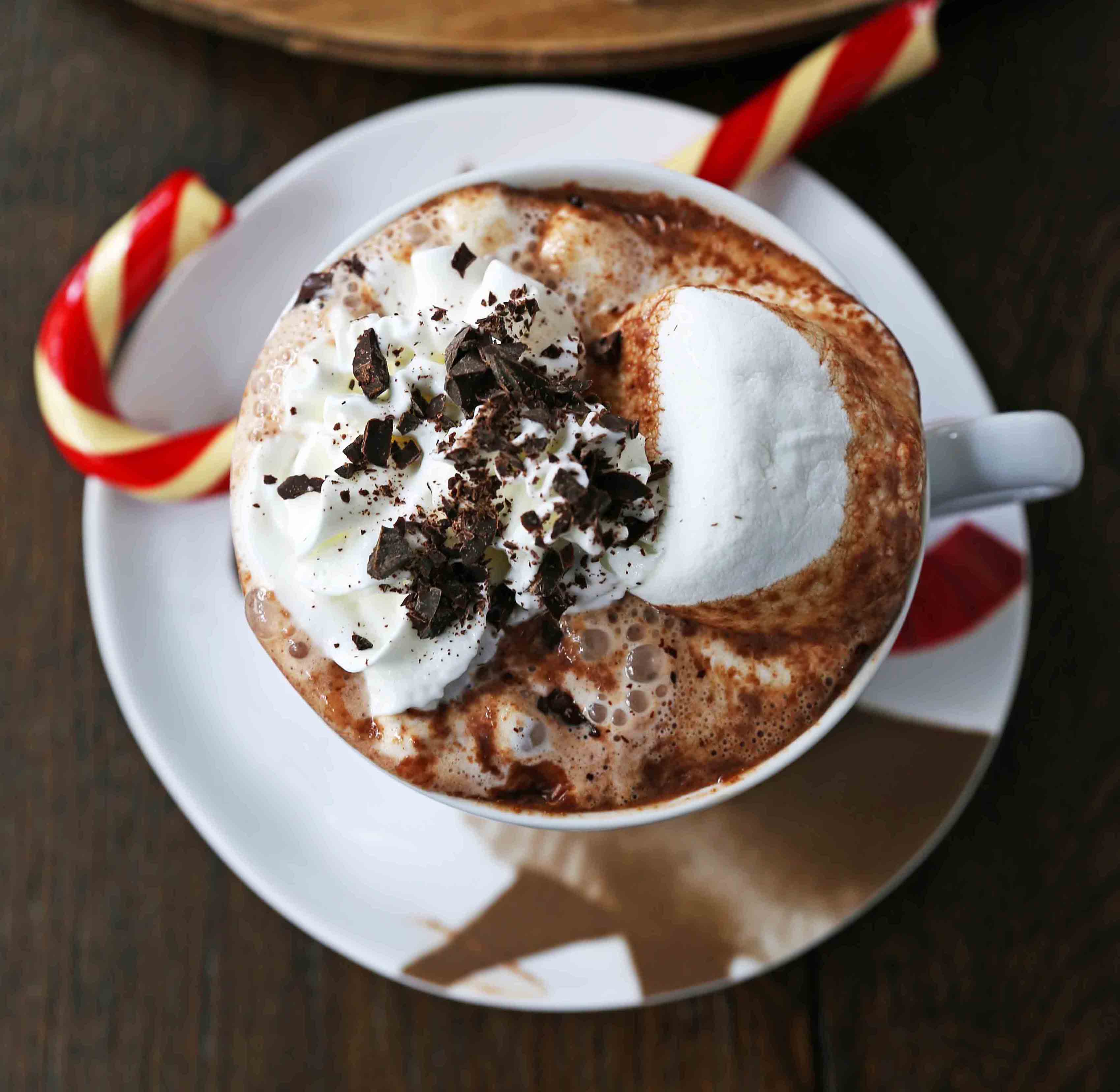 Homemade Hot Chocolate Recipe. How to make easy 5-ingredient gourmet hot chocolate. This Slow Cooker Hot Chocolate is perfect to serve at parties. A list of hot chocolate toppings ideas to make your very own Hot Chocolate Bar. www.modernhoney.com #hotchocolate #homemadehotchocolate #chocolate #hotchocolatebar #hotchocolatetoppings #christmas