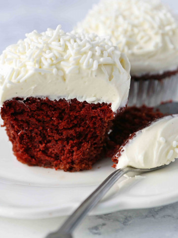 Red Velvet Cupcakes. The Best Red Velvet Cupcake Recipe with Cream Cheese Frosting. All of the tips and tricks for making perfect red velvet cupcakes every single time! www.modernhoney.com #redvelvet #redvelvetcupcakes #redvelvetcupcake