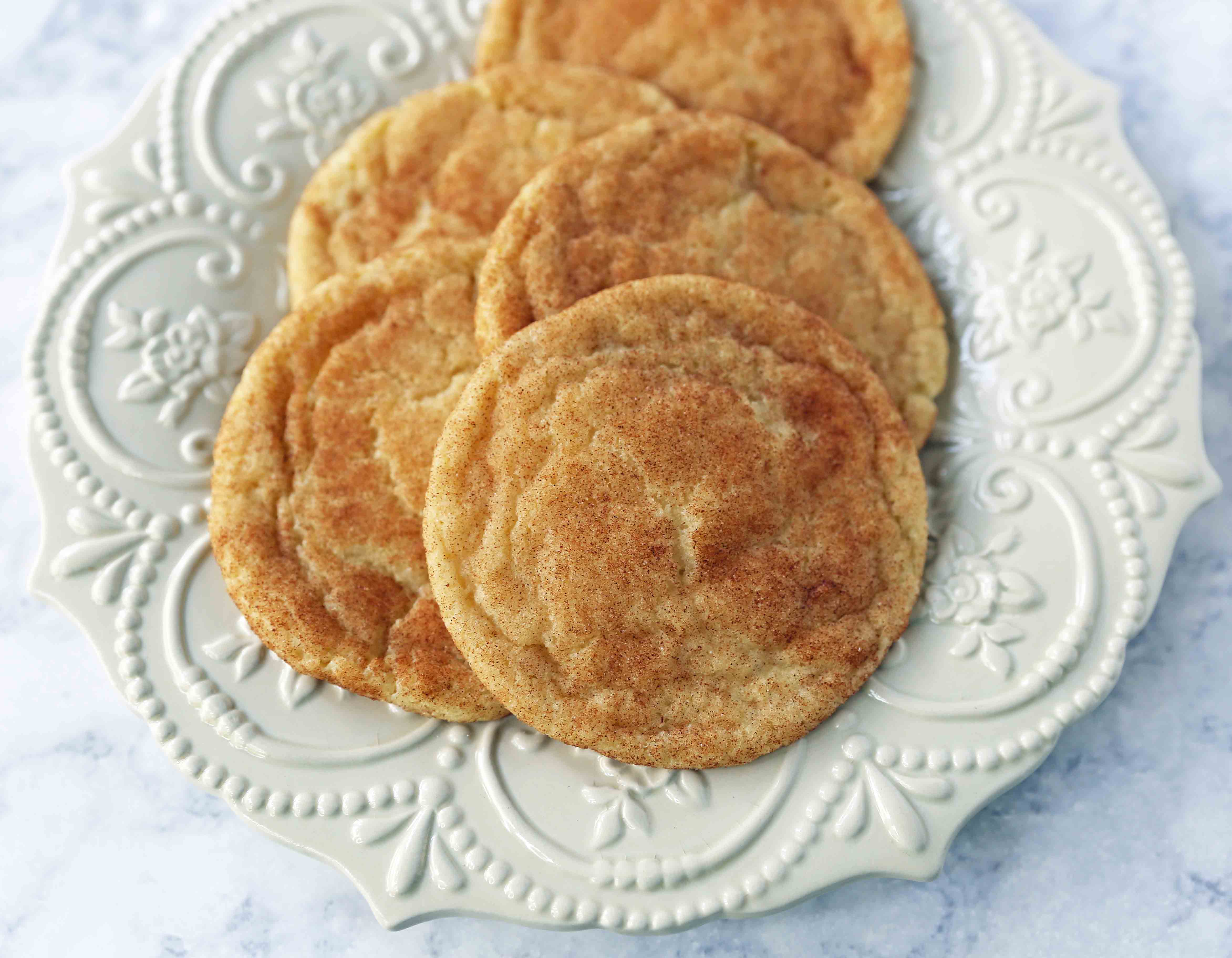The Best Snickerdoodle Cookie Recipe. Soft and Chewy Snickerdoodle Cookies. The popular cinnamon-sugar soft and chewy sugar cookie recipe. A recipe that has been in the family for over 30 years! #snickerdoodle #snickerdoodles #snickerdoodlecookies #snickerdoodlecookie #cookie #cookies #christmascookies #christmascookies www.modernhoney.com