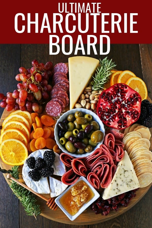 How to make an EPIC Charcuterie Board (AKA Meat and Cheese Platter). How to make a beautiful meat cheese and fruit platter. The perfect appetizer for your next party! www.modernhoney.com #meatboard #meatandcheeseboard #appetizer #appetizers #charcuterieboard #charcuterie #cheeseboard