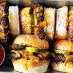 Cheeseburger Sliders. How to make the perfect cheese sliders. Super Bowl food. www.modernhoney.com #sliders #cheeseburgers #hamburgers #burgers #burger