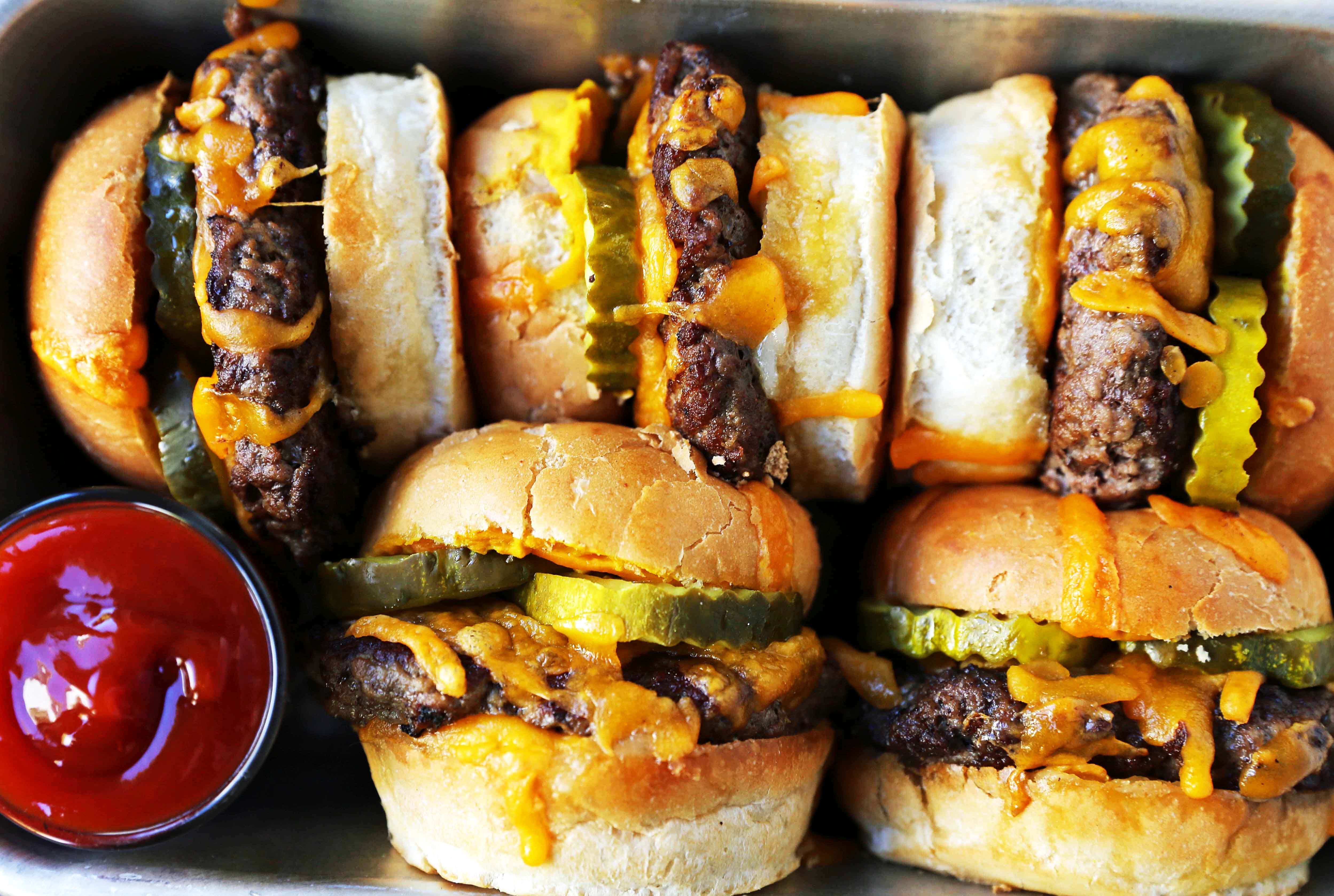 Cheeseburger Sliders. How to make the perfect cheese sliders. Super Bowl food. www.modernhoney.com #sliders #cheeseburgers #hamburgers #burgers #burger