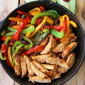 The Best Chicken Fajitas Recipe. Flavorful, juicy, seasoned chicken fajitas with sauteed onions and peppers. The perfect chicken fajitas recipe! www.modernhoney.com #chicken #chickenfajitas #fajitas #mexican #mexicanfood
