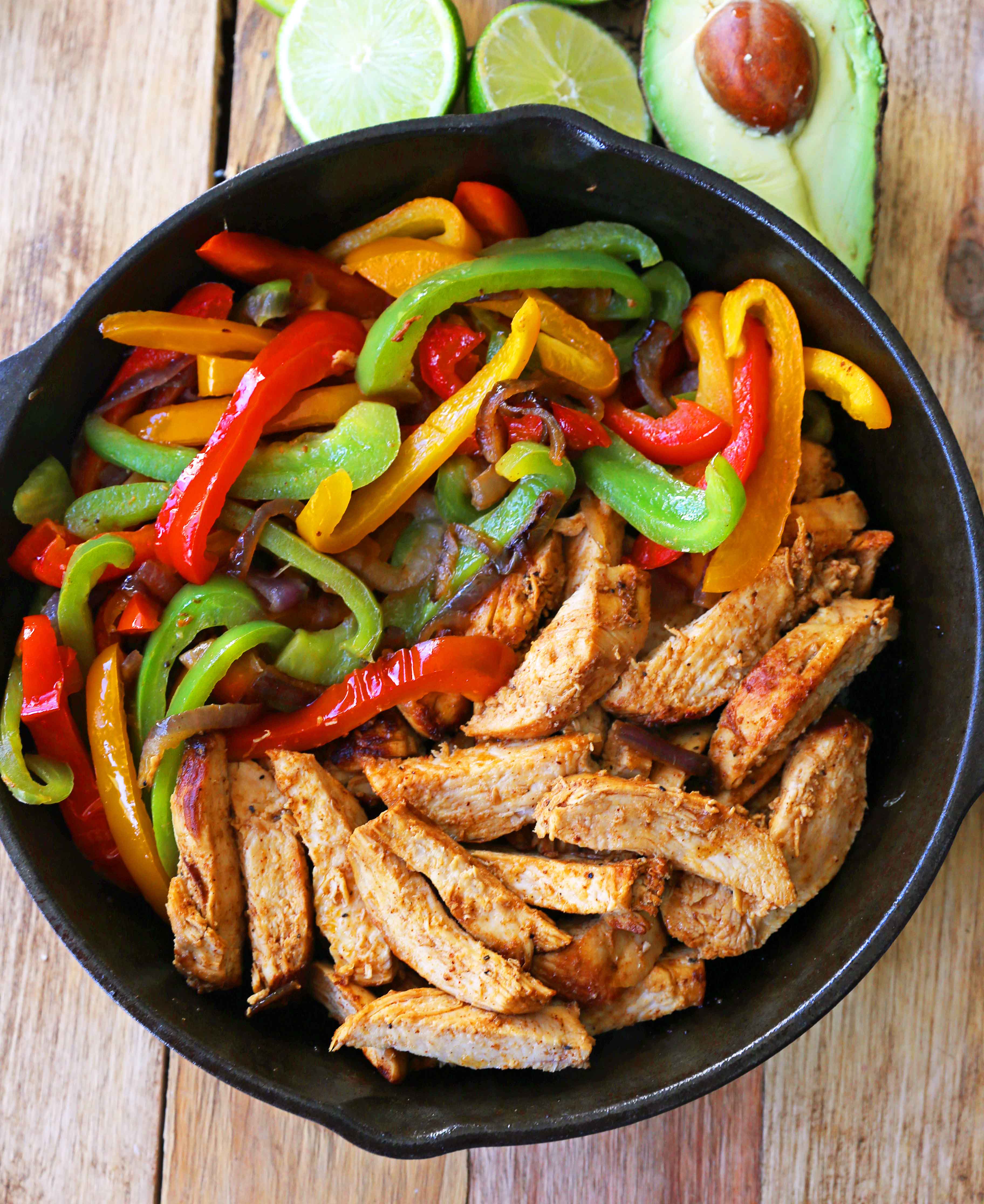 The Best Chicken Fajitas Recipe. Flavorful, juicy, seasoned chicken fajitas with sauteed onions and peppers.  The perfect chicken fajitas recipe! www.modernhoney.com #chicken #chickenfajitas #fajitas #mexican #mexicanfood