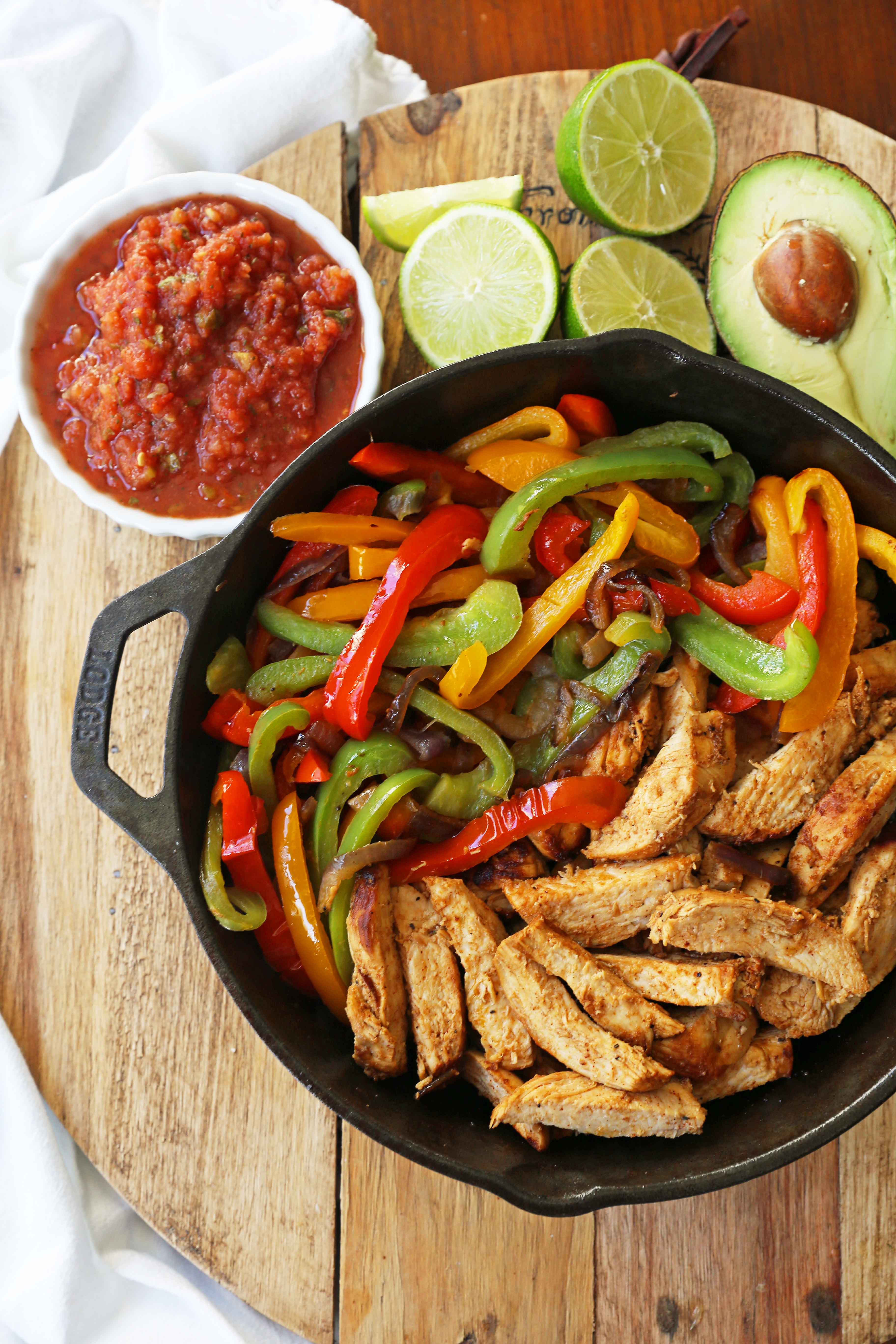 The Best Chicken Fajitas Recipe. Flavorful, juicy, seasoned chicken fajitas with sauteed onions and peppers.  The perfect chicken fajitas recipe! www.modernhoney.com #chicken #chickenfajitas #fajitas #mexican #mexicanfood 