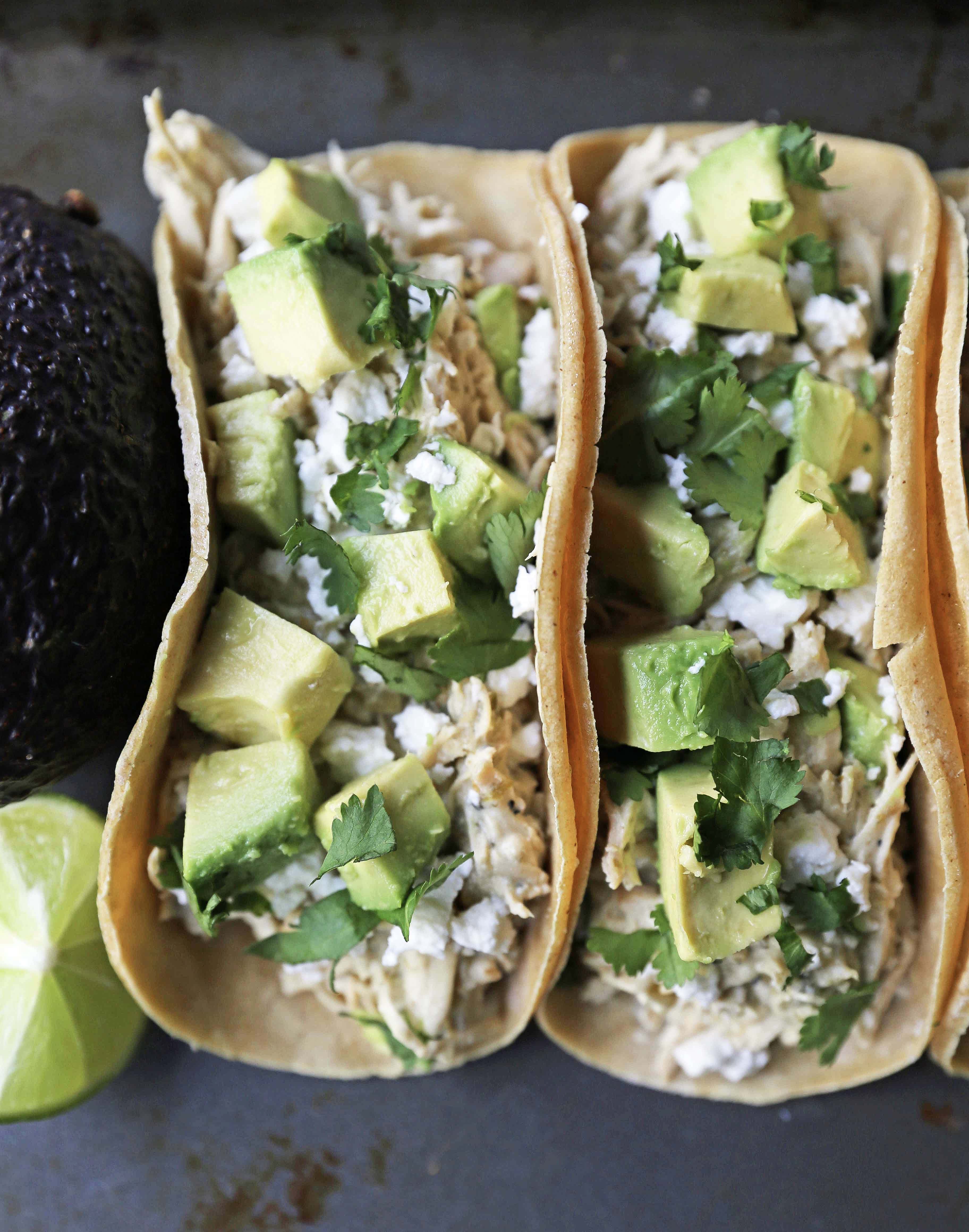 Creamy Crockpot Salsa Verde Chicken Tacos. Slow Cooker 3-Ingredient Creamy Salsa Verde Chicken Recipe. A quick, easy, flavorful meal! www.modernhoney.com #tacos #chickentacos #slowcooker #crockpot #crockpotchicken