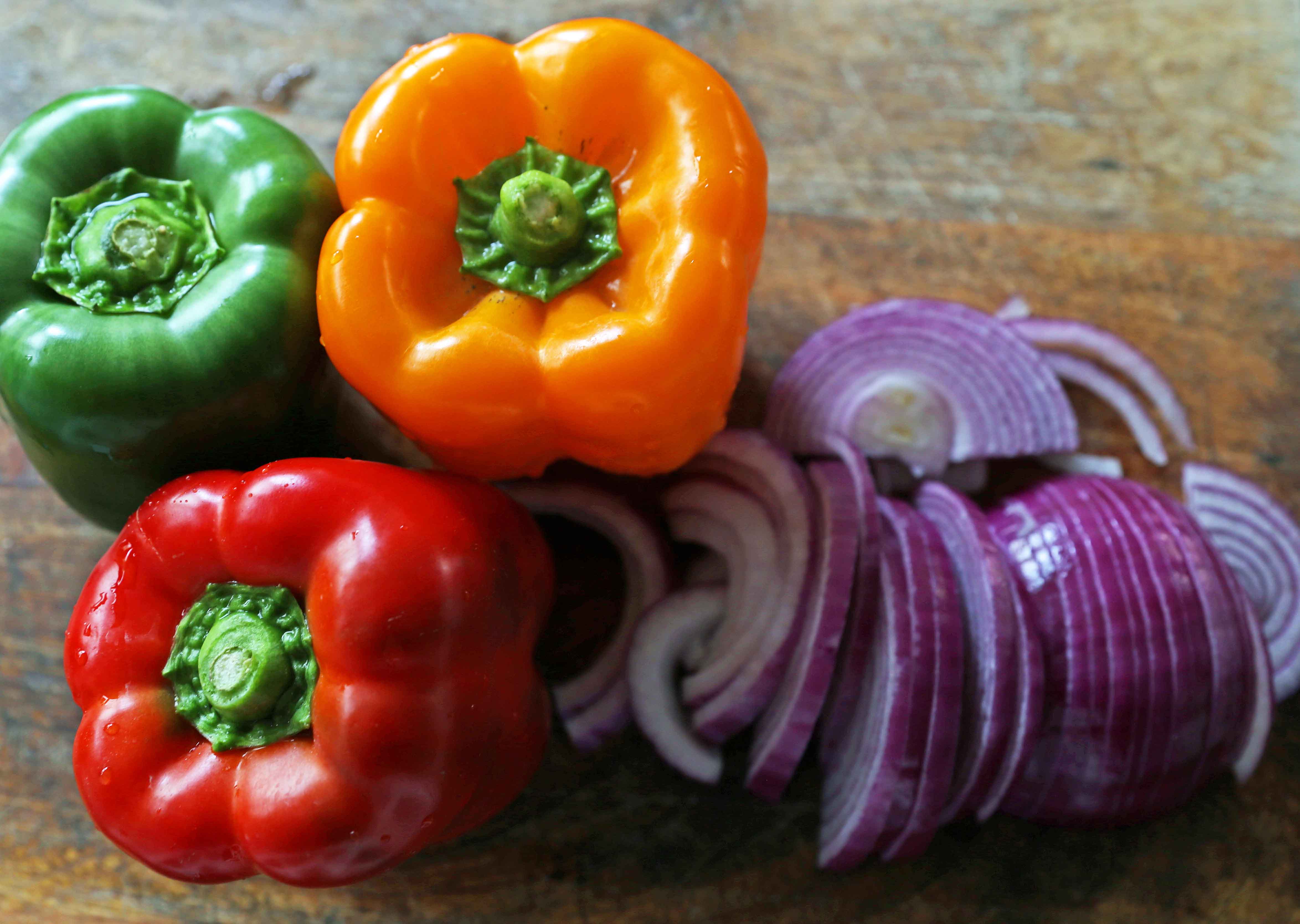 Peppers and Onions for Chicken Fajitas. The Best Chicken Fajitas Recipe. Flavorful, juicy, seasoned chicken fajitas with sauteed onions and peppers.  The perfect chicken fajitas recipe! www.modernhoney.com #chicken #chickenfajitas #fajitas #mexican #mexicanfood 