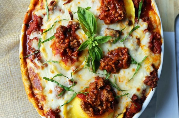 Ravioli Lasagna. Quick and Easy Lasagna Recipe made with cheese ravioli, meat sauce, and melted mozzarella cheese. How to make the best ravioli lasagna. www.modernhoney.com #lasagna #italian #italianfood #ravioli #dinner #dinnerrecipe