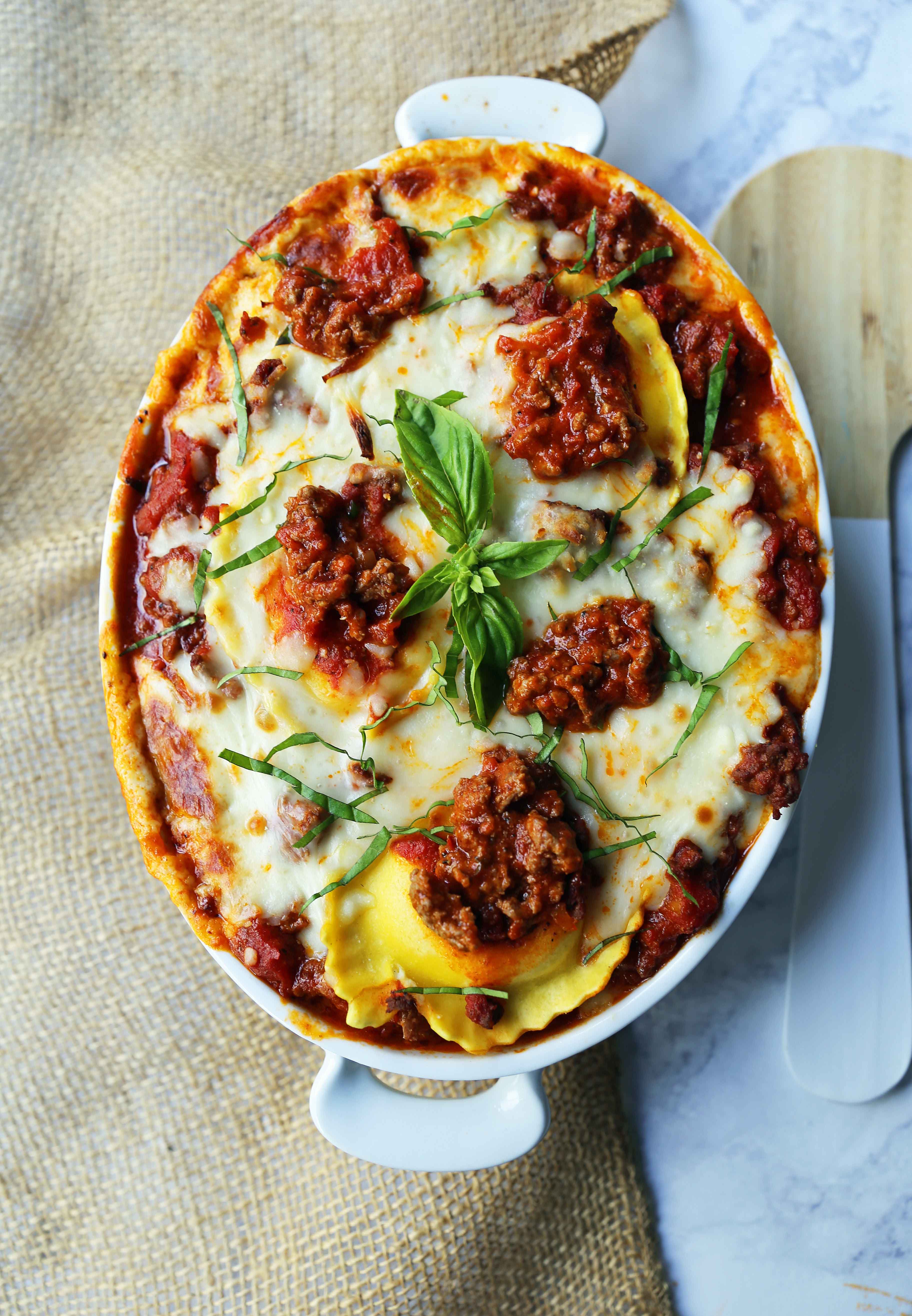 Ravioli Lasagna. Quick and Easy Lasagna Recipe made with cheese ravioli, meat sauce, and melted mozzarella cheese. How to make the best ravioli lasagna. www.modernhoney.com #lasagna #italian #italianfood #ravioli #dinner #dinnerrecipe 