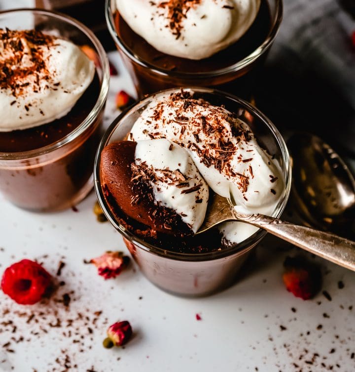 Chocolate Pot de Creme. Rich velvety smooth chocolate custard topped with fresh whipped cream. A pot of cream made with melted chocolate, heavy cream, sugar, and egg yolks. A decadent chocolate dessert!