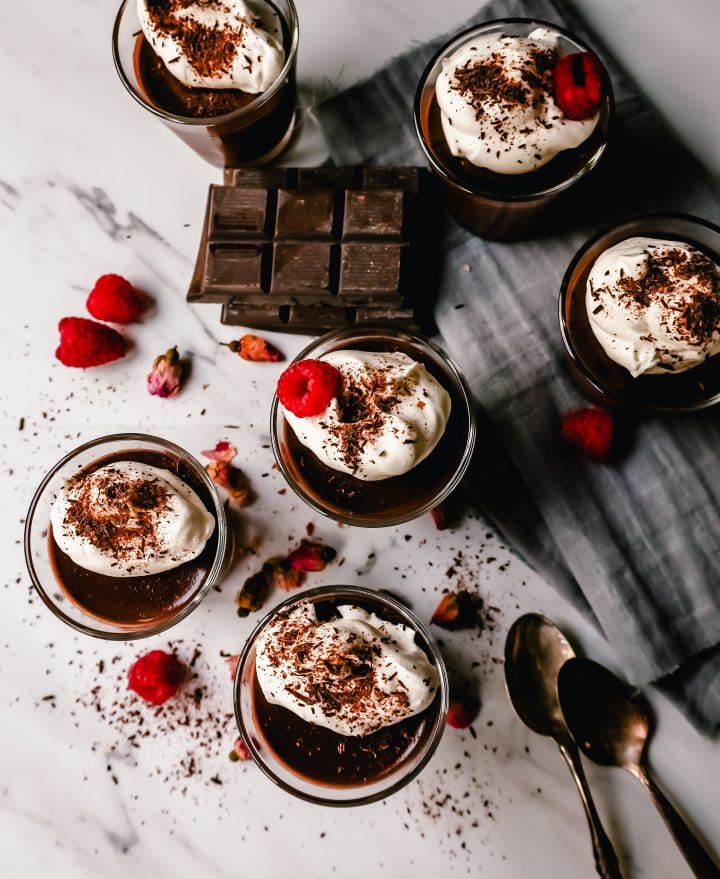 Chocolate Pot de Creme. Rich velvety smooth chocolate custard topped with fresh whipped cream. A pot of cream made with melted chocolate, heavy cream, sugar, and egg yolks. A decadent chocolate dessert!