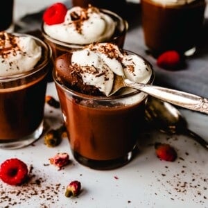 Chocolate Pot de Creme. Rich velvety smooth chocolate custard topped with fresh whipped cream. A pot of cream made with melted chocolate, heavy cream, sugar, and egg yolks. A decadent chocolate dessert!