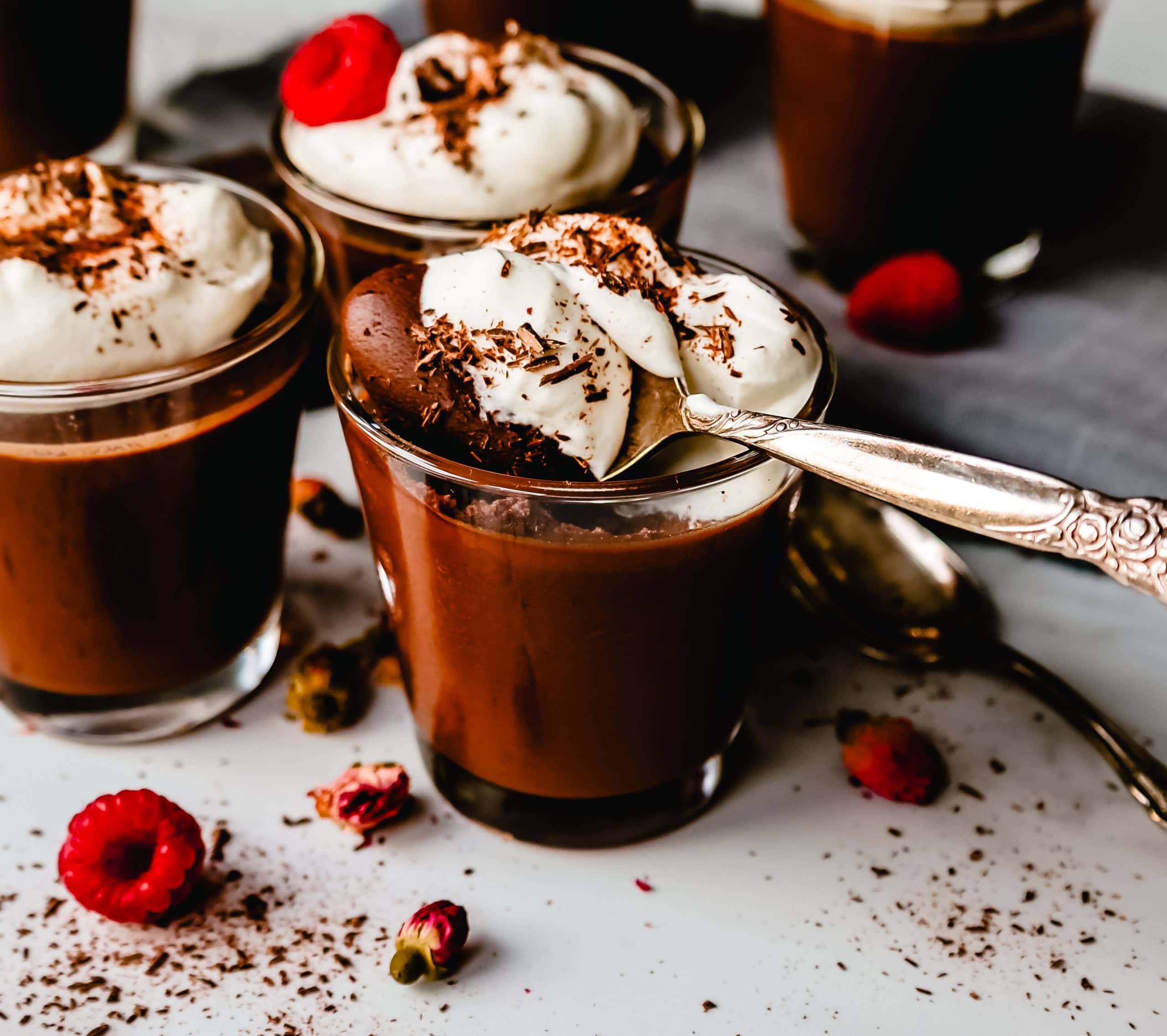 Chocolate Pot de Creme. Rich velvety smooth chocolate custard topped with fresh whipped cream. A pot of cream made with melted chocolate, heavy cream, sugar, and egg yolks. A decadent chocolate dessert!