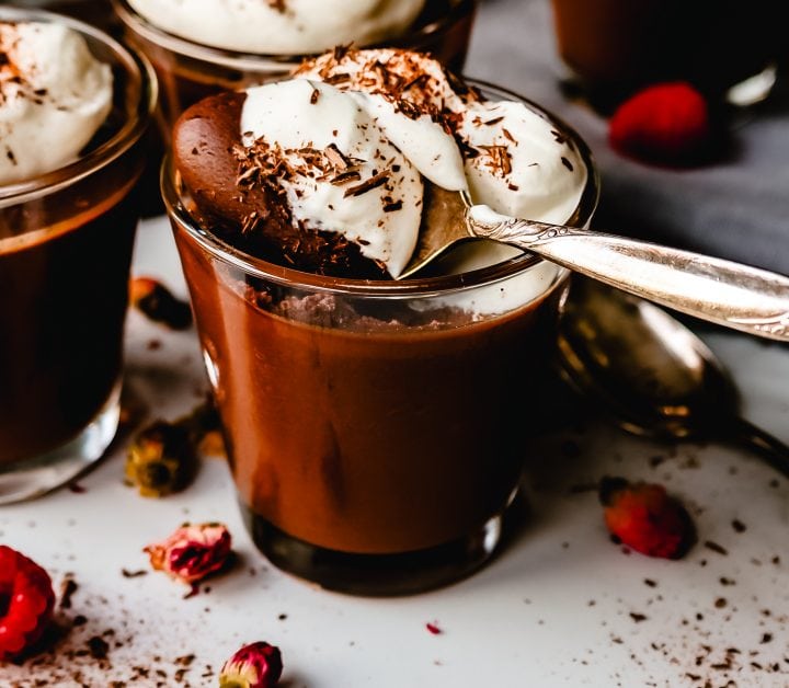 Chocolate Pot de Creme. Rich velvety smooth chocolate custard topped with fresh whipped cream. A pot of cream made with melted chocolate, heavy cream, sugar, and egg yolks. A decadent chocolate dessert!