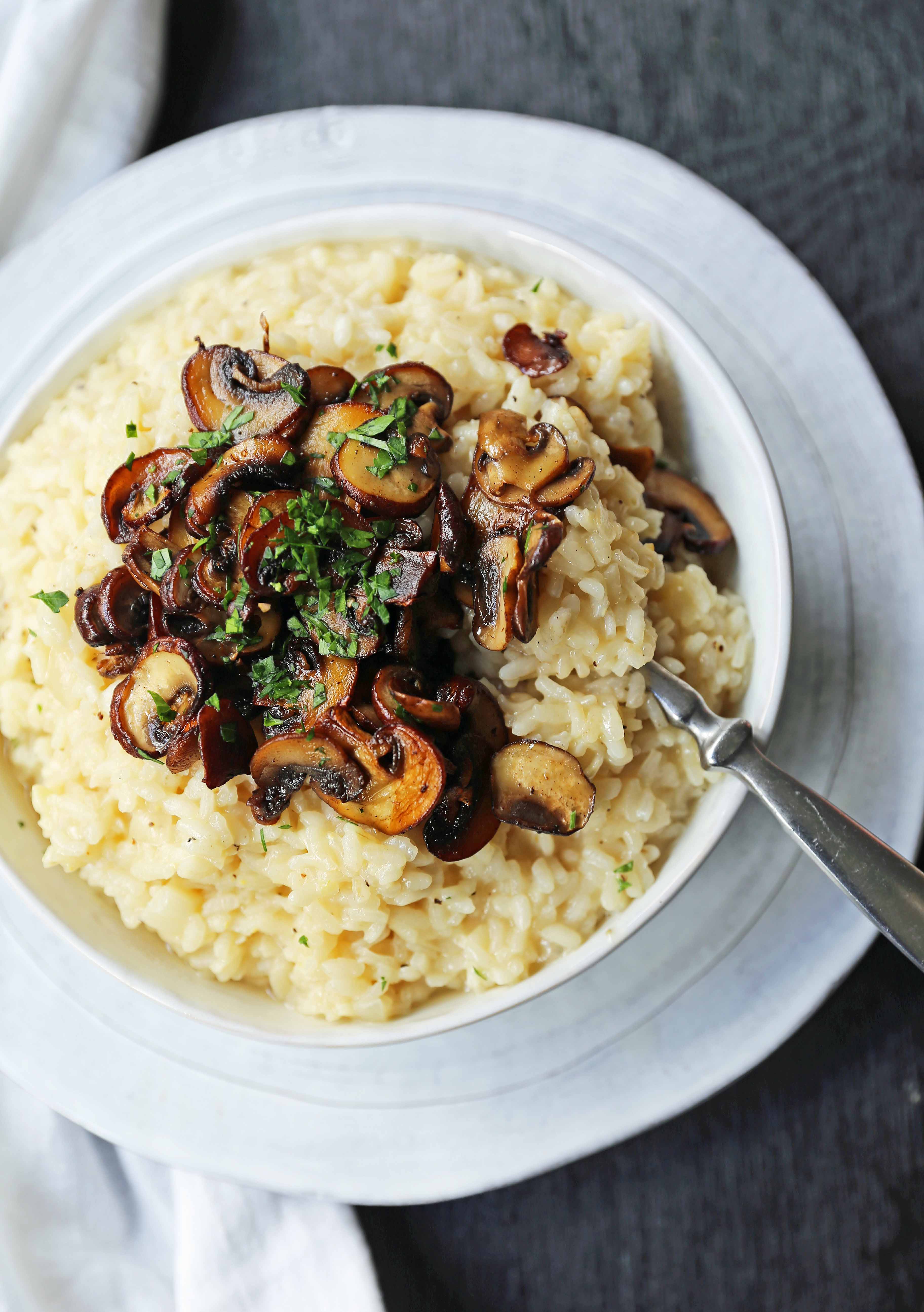 Creamy Mushroom Risotto. Rich, creamy rice slowly simmered with chicken broth, butter, parmesan cheese, and topped with butter sauteed mushrooms. www.modernhoney.com #risotto #homemaderisotto #mushroomrisotto