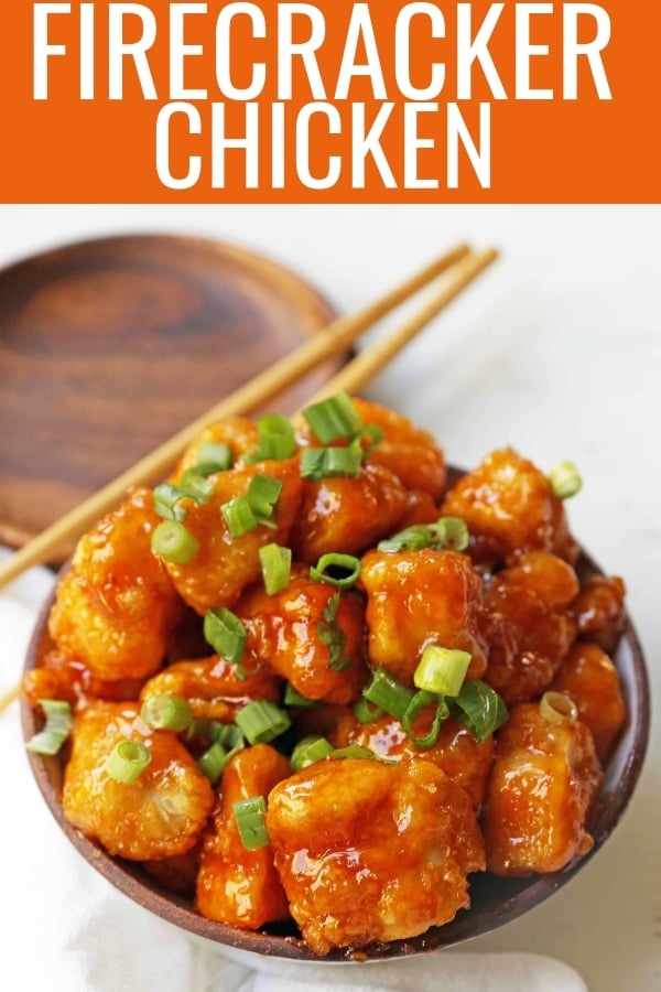 Firecracker Chicken. Sweet and spicy chicken bites made with tender chicken, flash-fried, and baked in a sweet brown sugar buffalo sauce. You'll have people coming back for seconds in no time at all! www.modernhoney.com #firecrackerchicken #buffalochicken #chicken #chickenbites