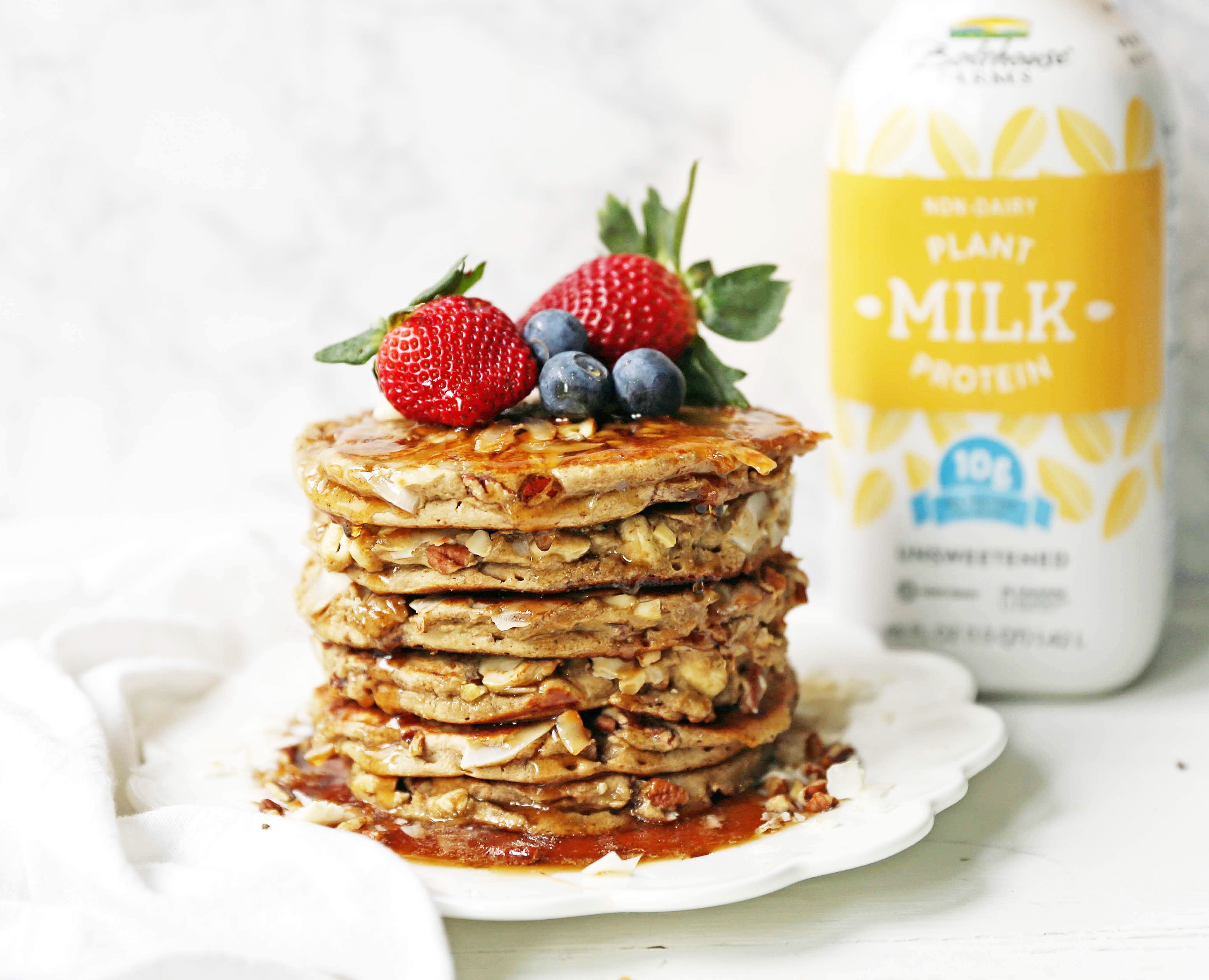 Nutty Granola Pancakes. Gluten-Free, Dairy-Free, No Added Sugar, Healthy Pancakes filled with oats, nuts, and coconut flakes. A hearty, filling breakfast! www.modernhoney.com #pancakes #pancake #healthy #glutenfree #dairyfree #breakfast