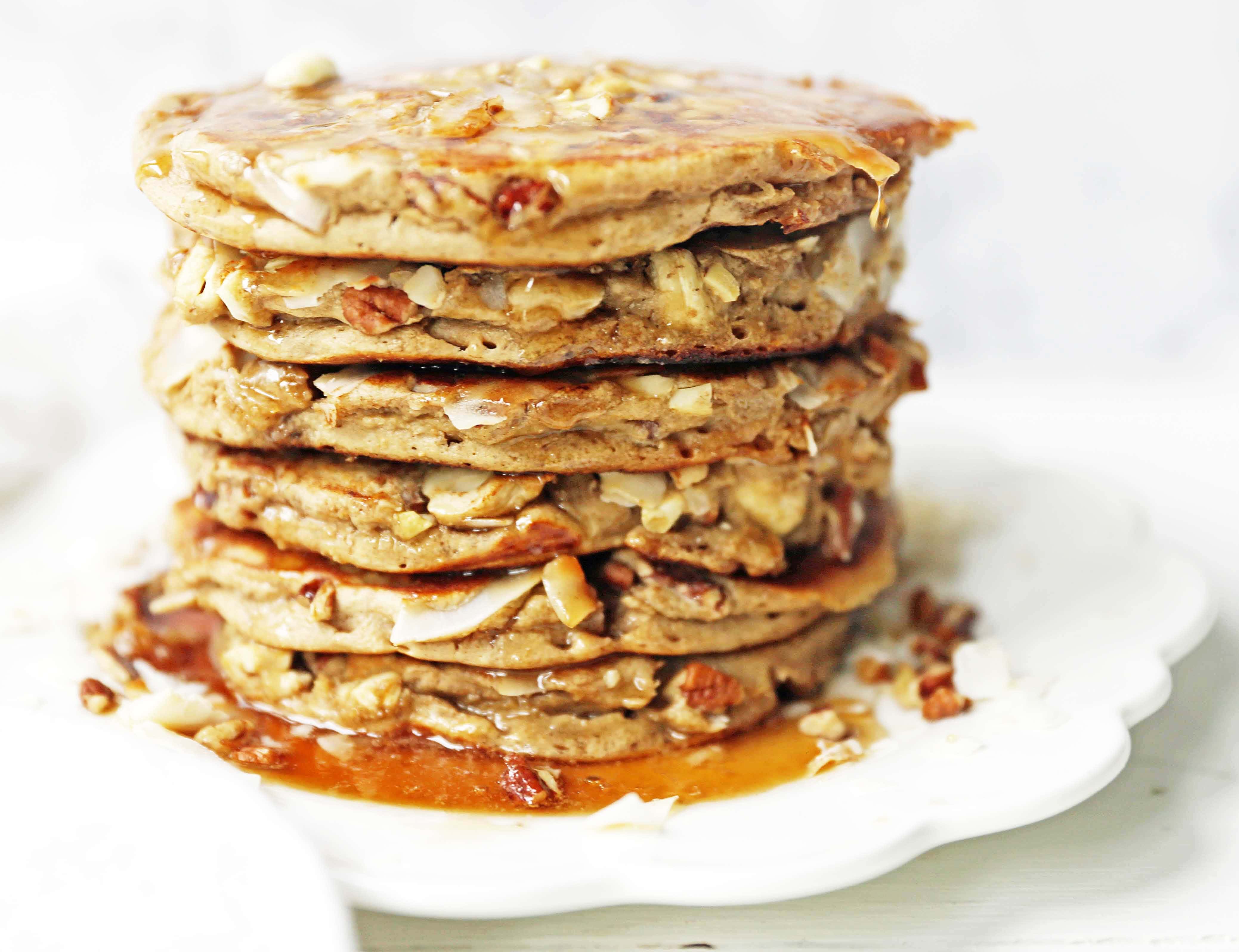 Nutty Granola Pancakes. Gluten-Free, Dairy-Free, No Added Sugar, Healthy Pancakes filled with oats, nuts, and coconut flakes. A hearty, filling breakfast! www.modernhoney.com #pancakes #pancake #healthy #glutenfree #dairyfree #breakfast