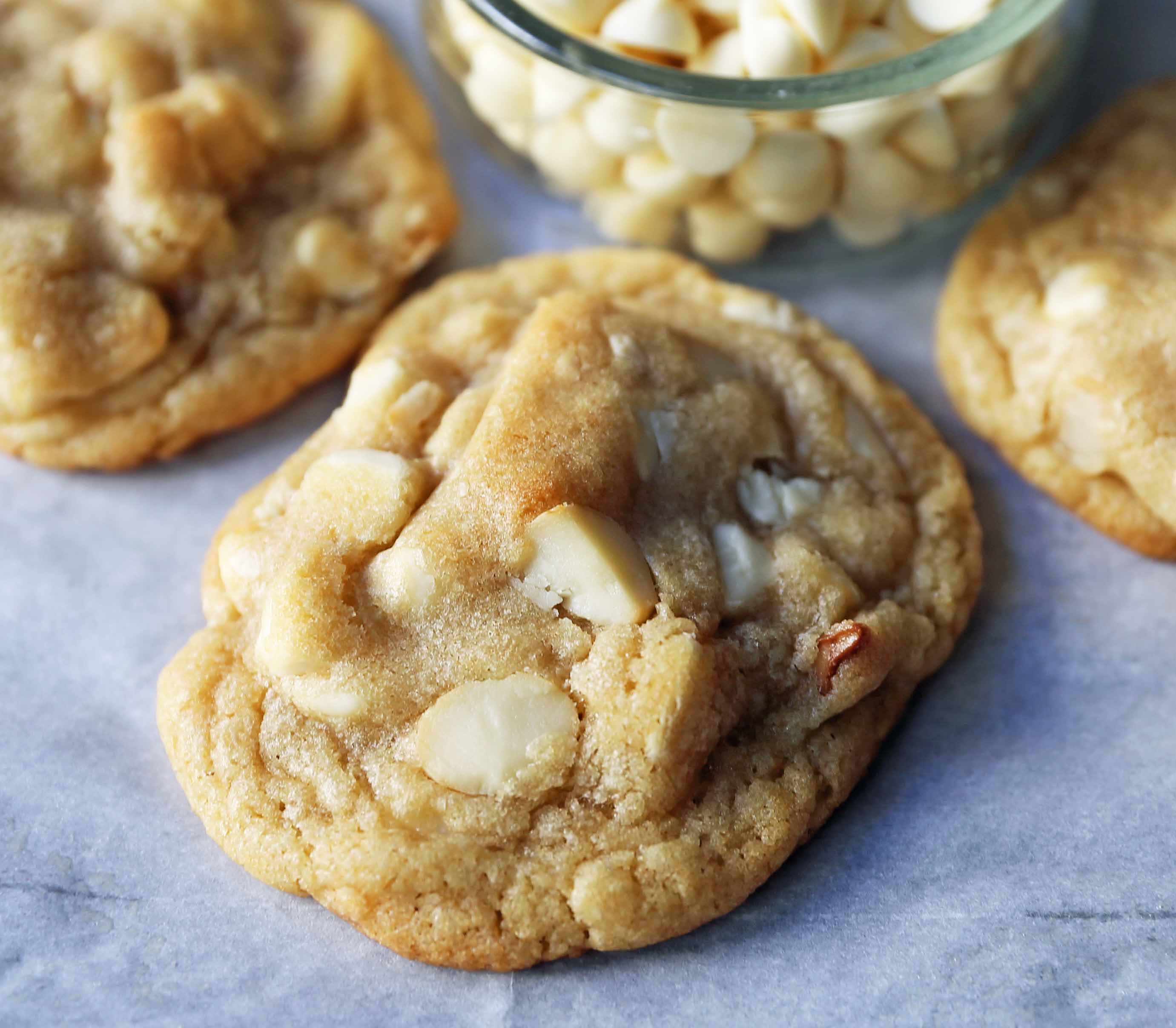 White Chocolate Macadamia Nut Cookies. Soft chewy white chocolate macadamia nut cookies are a sweet, buttery cookie and are always a crowd pleaser! www.modernhoney.com #whitechocolate #whitechocolatecookies #whitechocolatemacadamia #whitechocolatemacadamianutcookies #cookies #cookierecipe