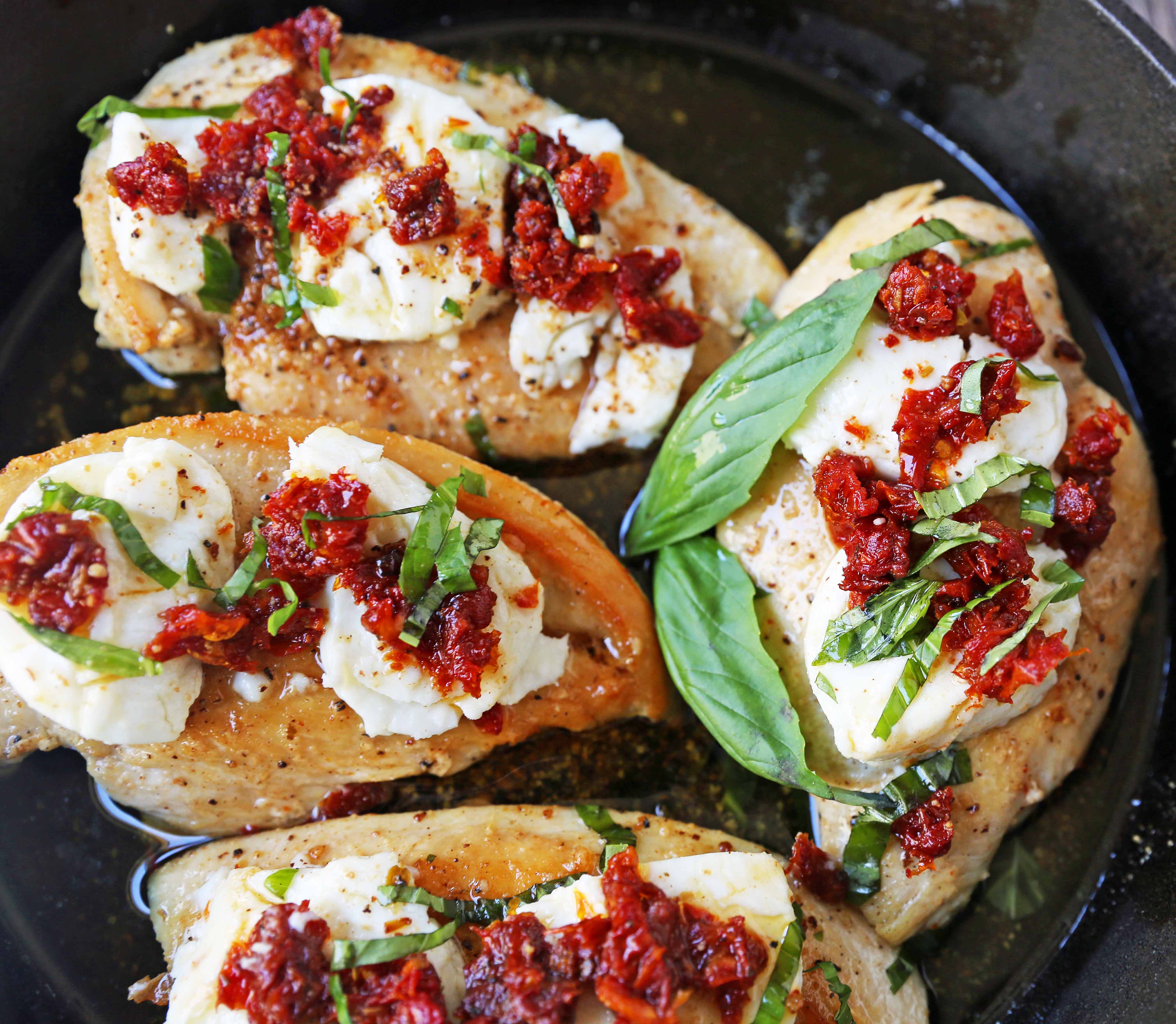 Chicken Bryan. Grilled chicken with a basil lemon butter sauce topped with sundried tomatoes and creamy goat cheese. A Carrabba's favorite! www.modernhoney.com #chickenbryan #carrabbas #chicken