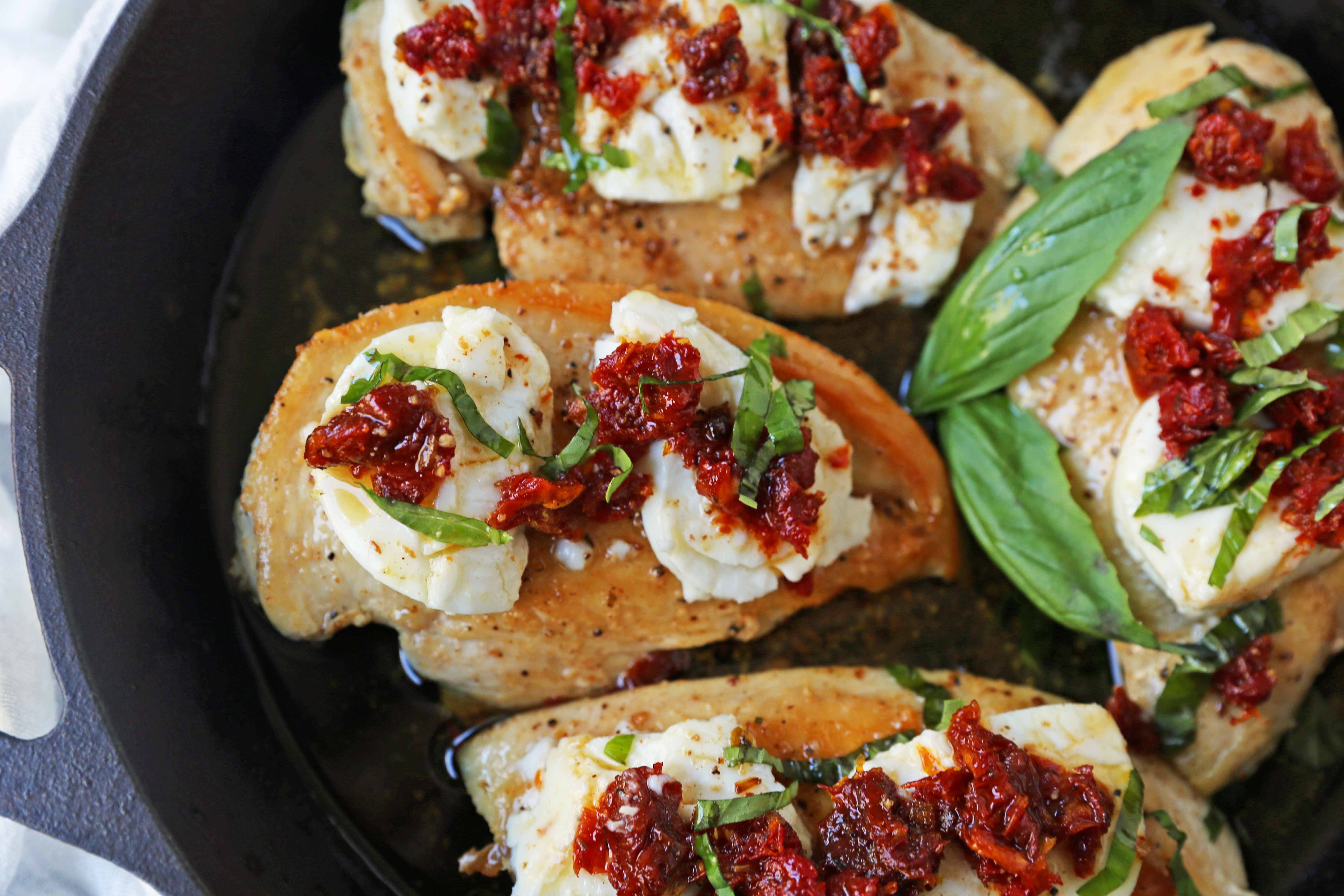 Chicken Bryan. Grilled chicken with a basil lemon butter sauce topped with sundried tomatoes and creamy goat cheese. A Carrabba's favorite! www.modernhoney.com #chickenbryan #carrabbas #chicken