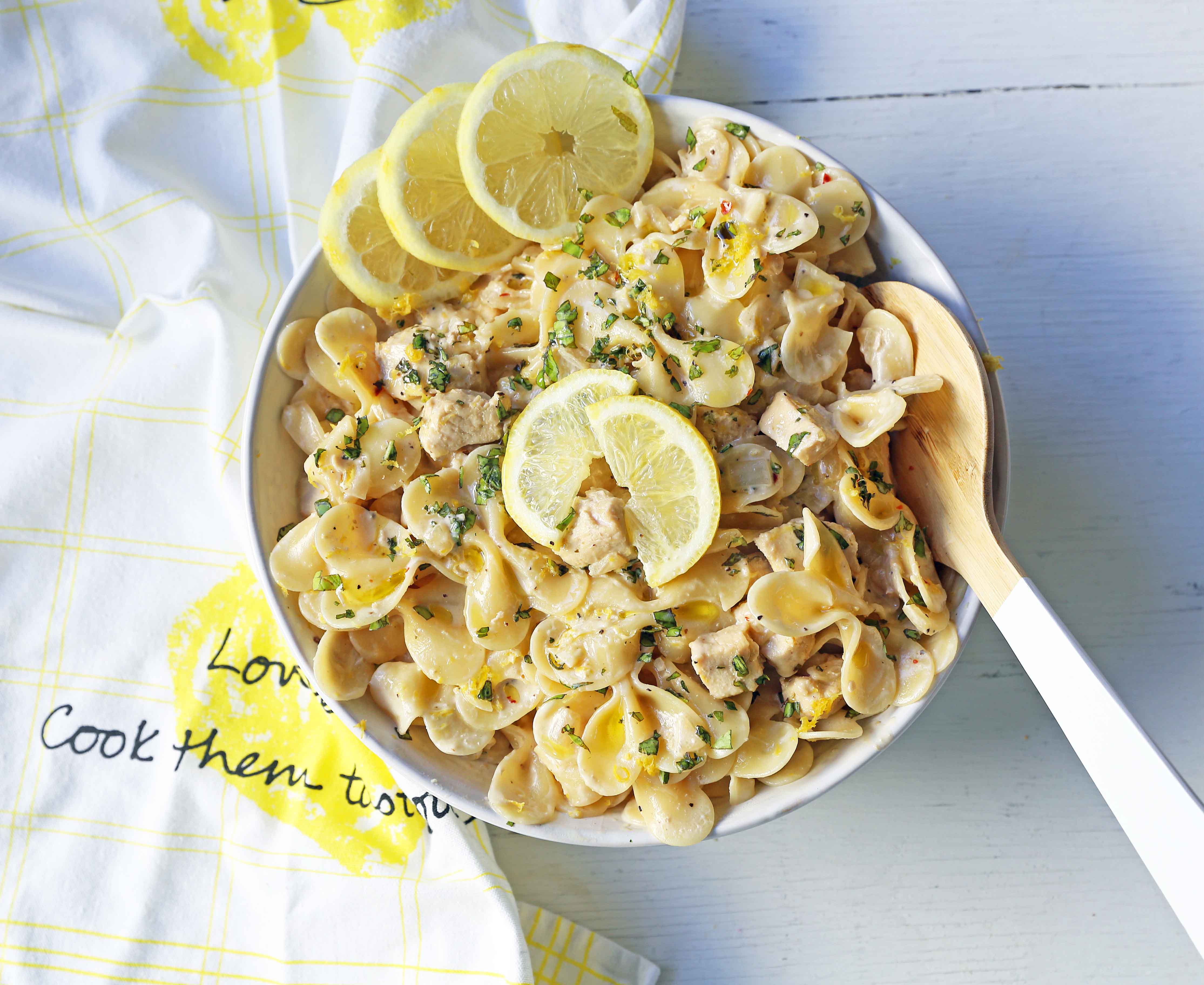 Creamy Lemon Chicken Pasta.Sauteed chicken in a rich creamy lemon basil sauce tossed with your favorite kind of pasta.  A quick and easy 30-minute meal! www.modernhoney.com #lemonpasta #lemonchickenpasta #pasta #pastarecipes