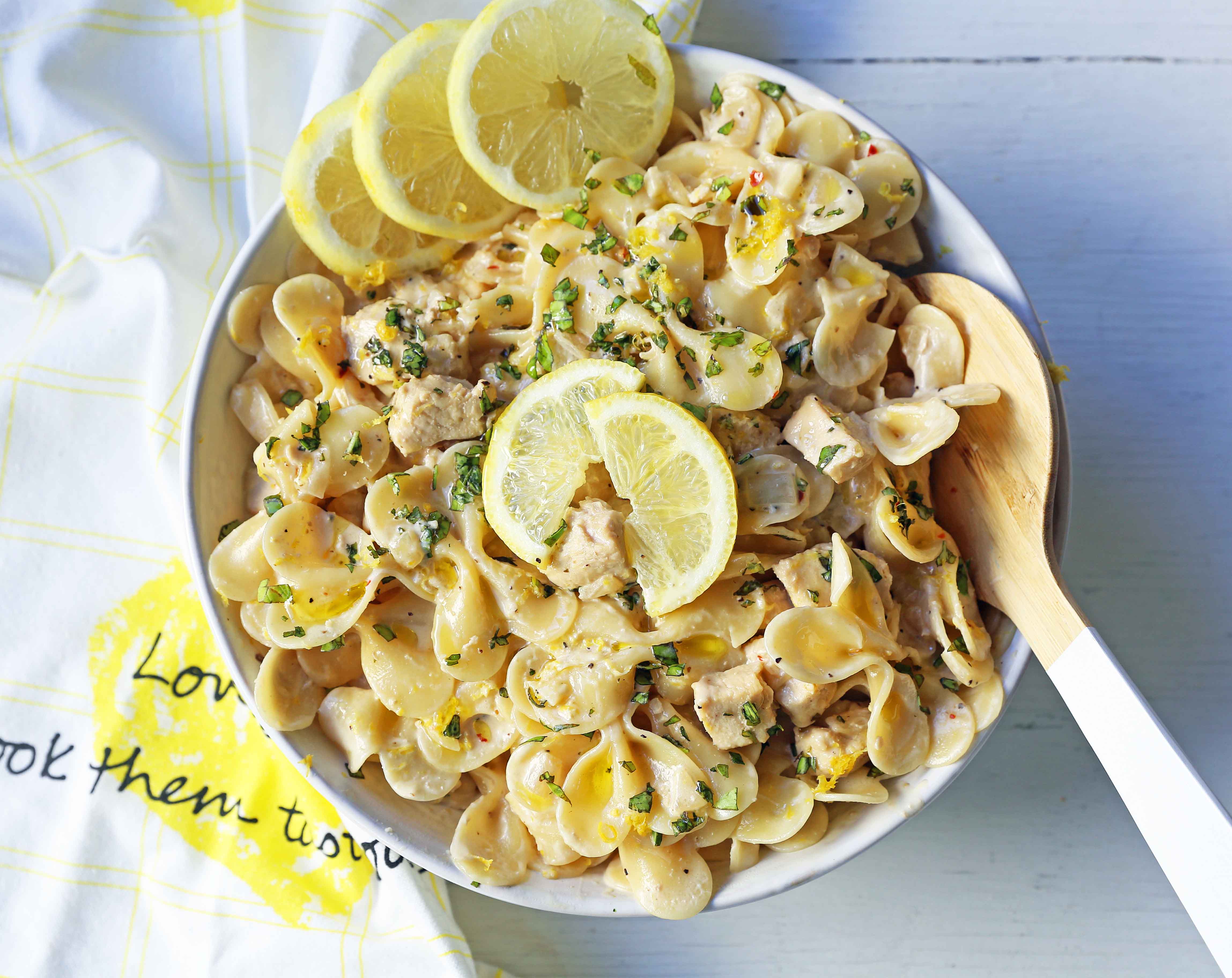 Creamy Lemon Chicken Pasta.Sauteed chicken in a rich creamy lemon basil sauce tossed with your favorite kind of pasta.  A quick and easy 30-minute meal! www.modernhoney.com #lemonpasta #lemonchickenpasta #pasta #pastarecipes