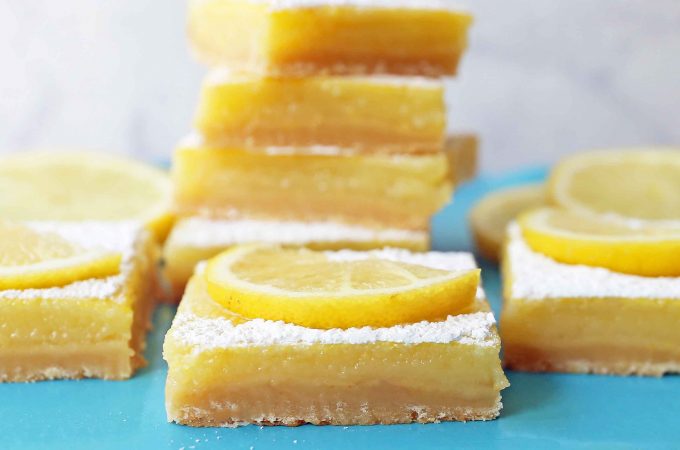 The Best Lemon Bars. Sweet and tangy lemon filling on a buttery shortbread crust. Tips and tricks for making the perfect lemon bar! www.modernhoney.com #lemonbar #lemonbars #lemondesserts #lemondessert #lemonsquare #lemonsquares