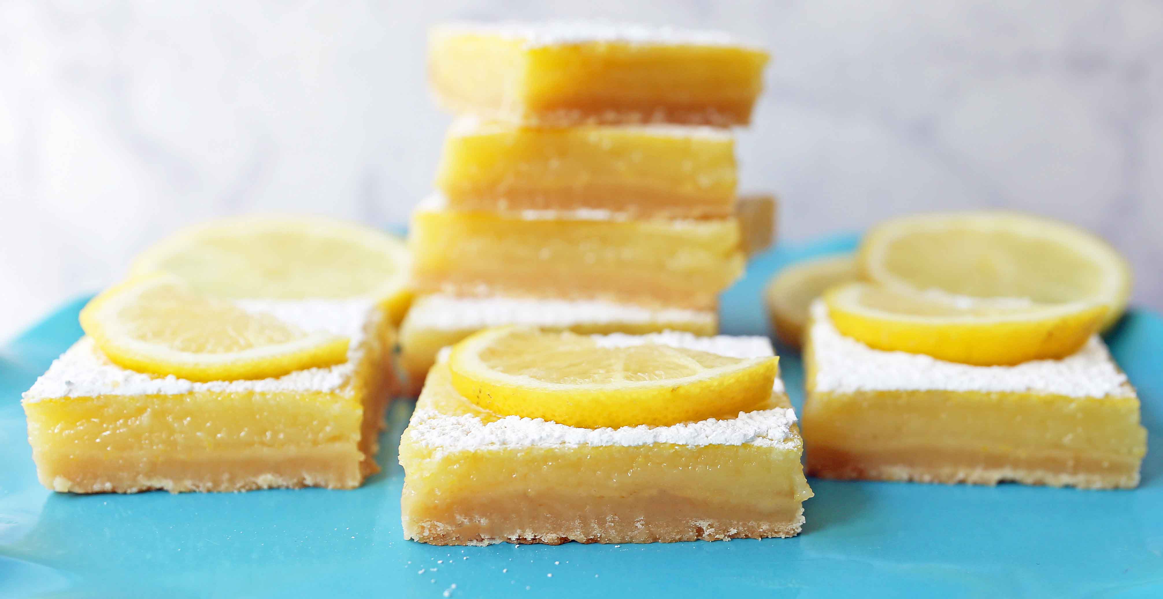 The Best Lemon Bars. Sweet and tangy lemon filling on a buttery shortbread crust. Tips and tricks for making the perfect lemon bar! www.modernhoney.com #lemonbar #lemonbars #lemondesserts #lemondessert #lemonsquare #lemonsquares