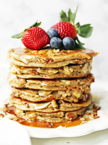 Nutty Granola Pancakes. Gluten-Free, Dairy-Free, No Added Sugar, Healthy Pancakes filled with oats, nuts, and coconut flakes. A hearty, filling breakfast! www.modernhoney.com #pancakes #pancake #healthy #glutenfree #dairyfree #breakfast