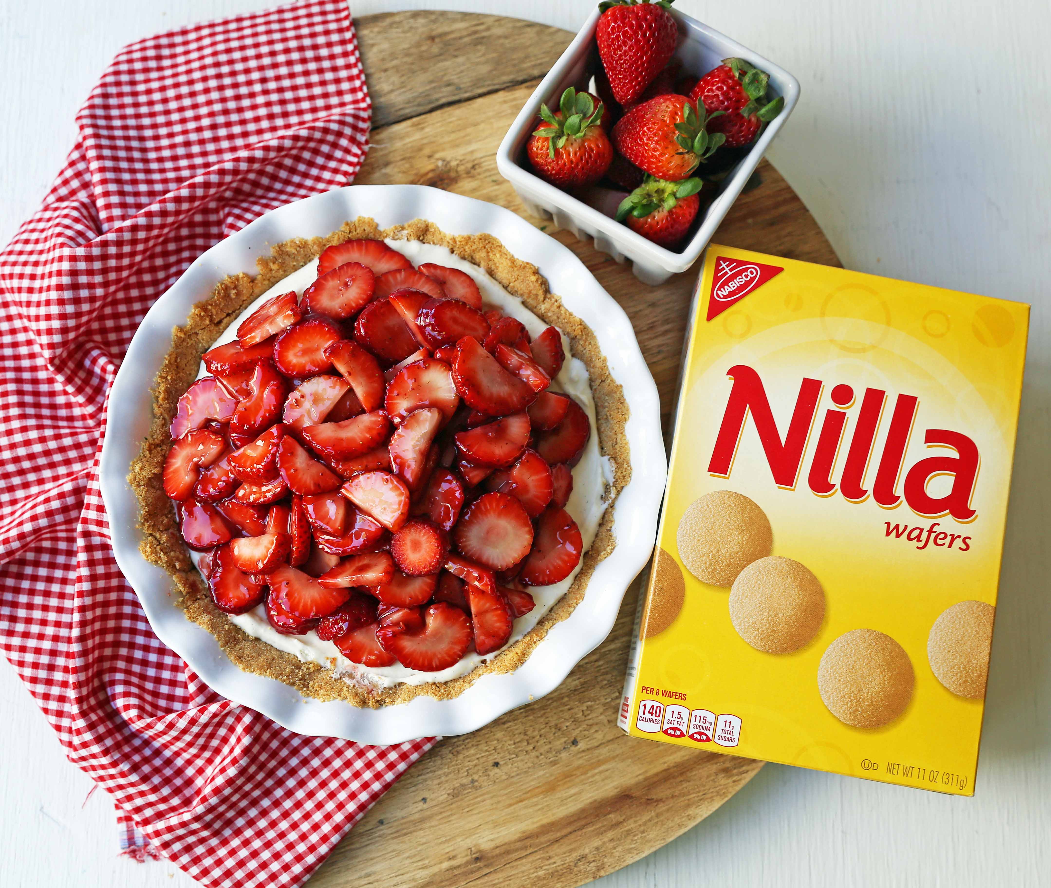 Strawberry Cream Cheese Pie. An easy sweet cream cheese pie with a buttery NILLA Wafer cookie crust and topped with glazed strawberries. The best strawberry pie! #strawberrypie #strawberries #pie #easter #easterdessert #creamcheesepie 