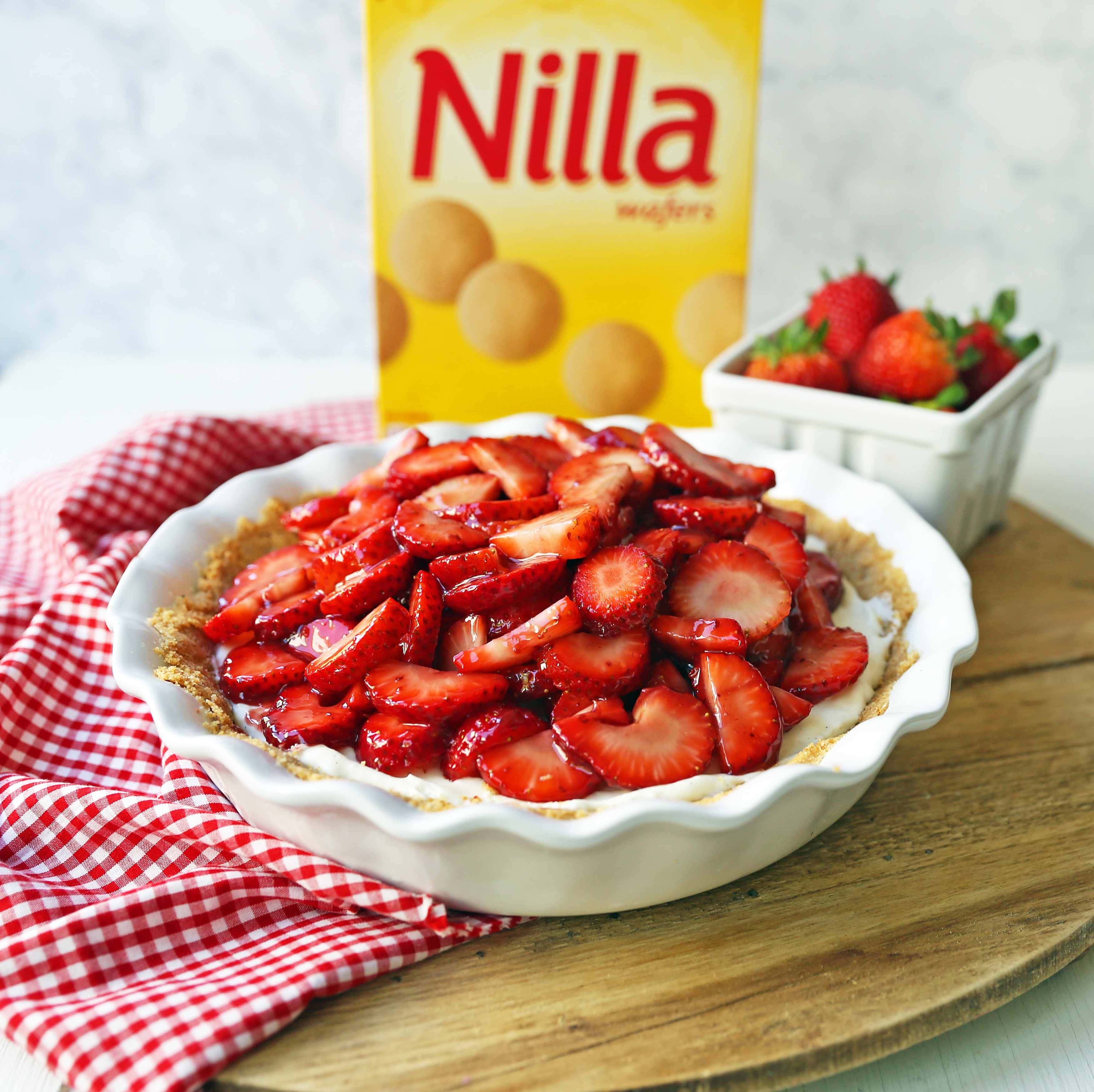 Strawberry Cream Cheese Pie. An easy sweet cream cheese pie with a buttery NILLA Wafer cookie crust and topped with glazed strawberries. The best strawberry pie! #strawberrypie #strawberries #pie #easter #easterdessert #creamcheesepie 