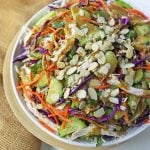 Thai Chicken Salad with Peanut Dressing. Crunchy Thai salad with cabbage, carrots, cucumber, slivered almonds, tender chicken in a homemade peanut dressing. A flavorful Chinese Chicken Salad. www.modernhoney.com #asiansalad #chickensalad #thaichickensalad #chinesechickensalad