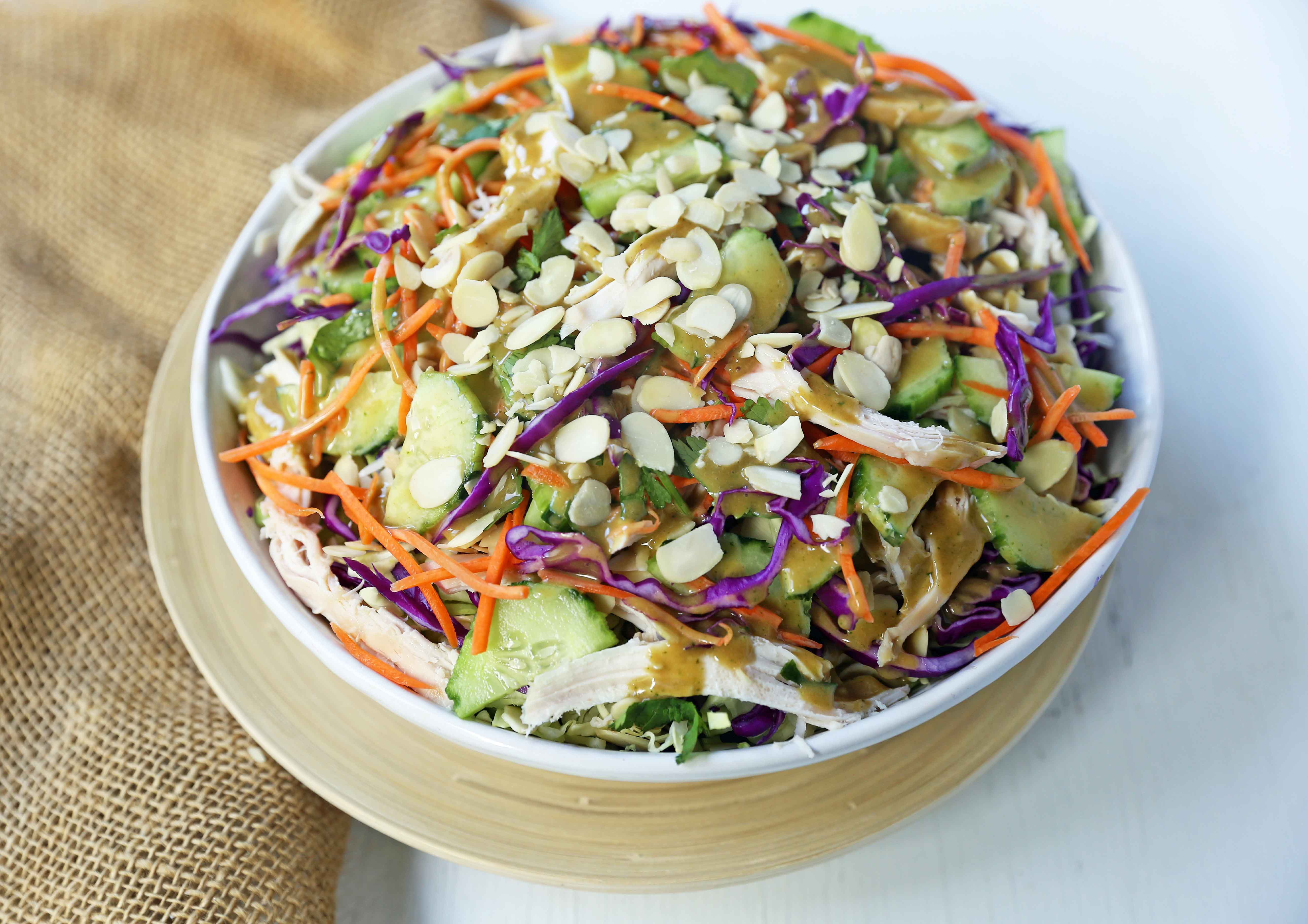 Thai Chicken Salad with Peanut Dressing. Crunchy Thai salad with cabbage, carrots, cucumber, slivered almonds, tender chicken in a homemade peanut dressing. A flavorful Chinese Chicken Salad. www.modernhoney.com #asiansalad #chickensalad #thaichickensalad #chinesechickensalad