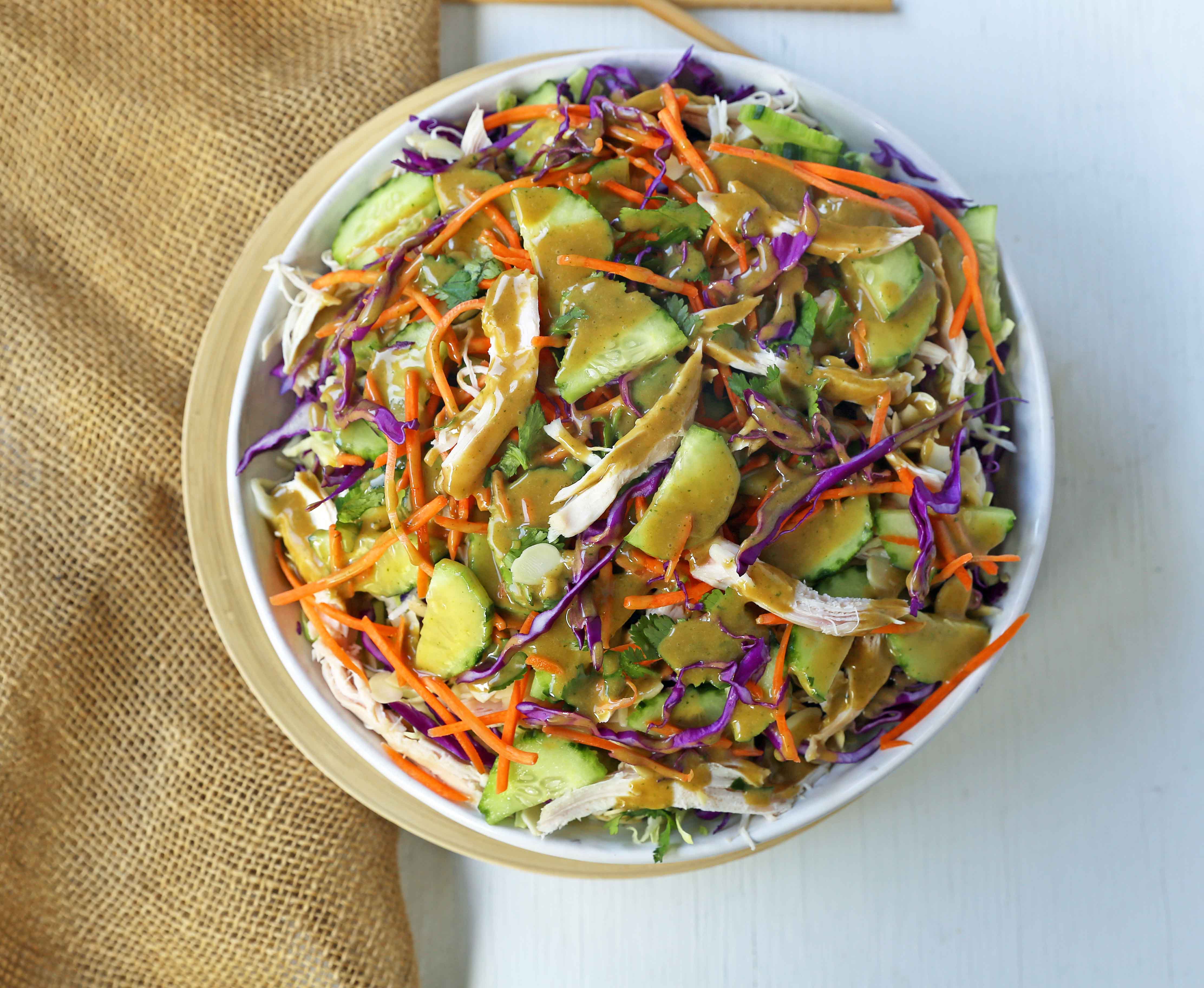 Thai Chicken Salad with Peanut Dressing. Crunchy Thai salad with cabbage, carrots, cucumber, slivered almonds, tender chicken in a homemade peanut dressing. A flavorful Chinese Chicken Salad. www.modernhoney.com #asiansalad #chickensalad #thaichickensalad #chinesechickensalad